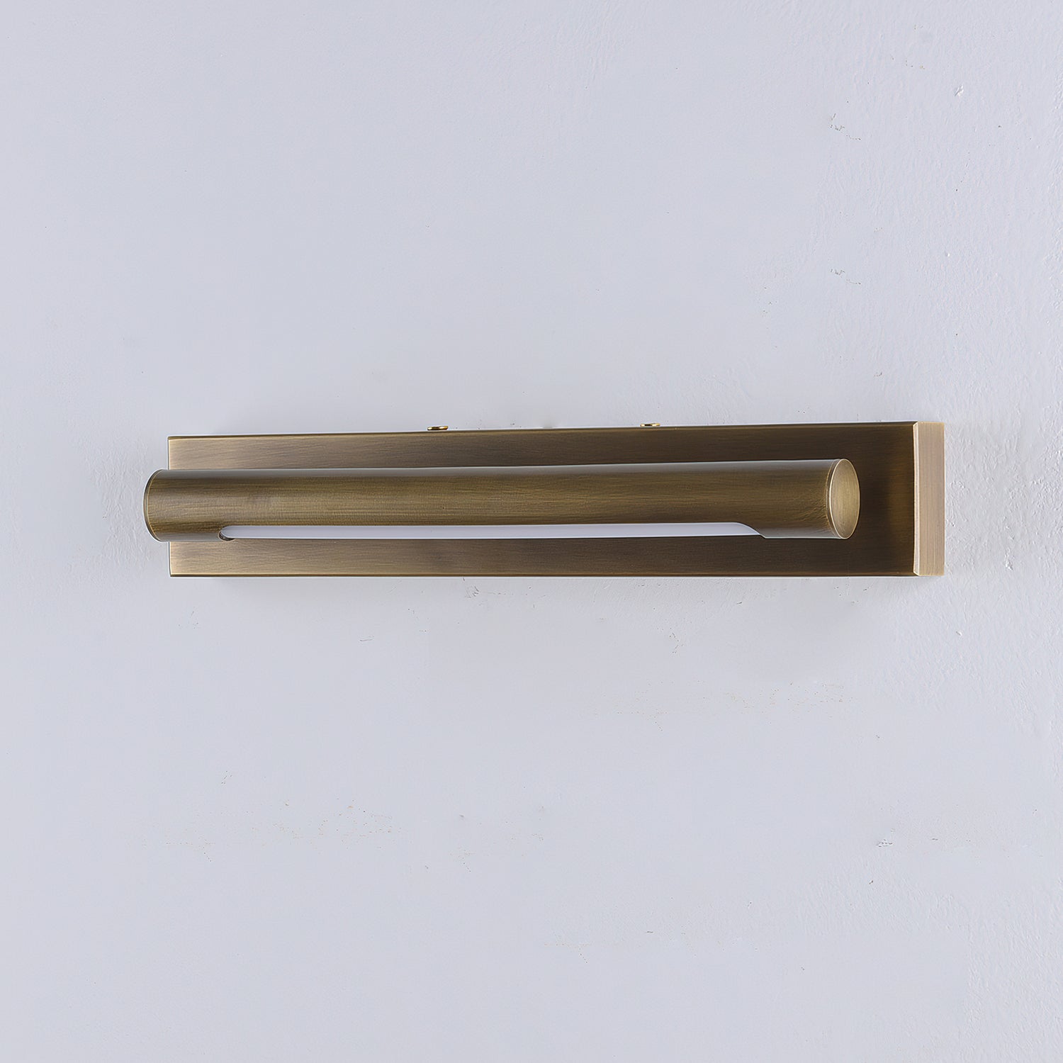 Angled view of the Penrith Linear Wall Sconce in a sleek black finish.