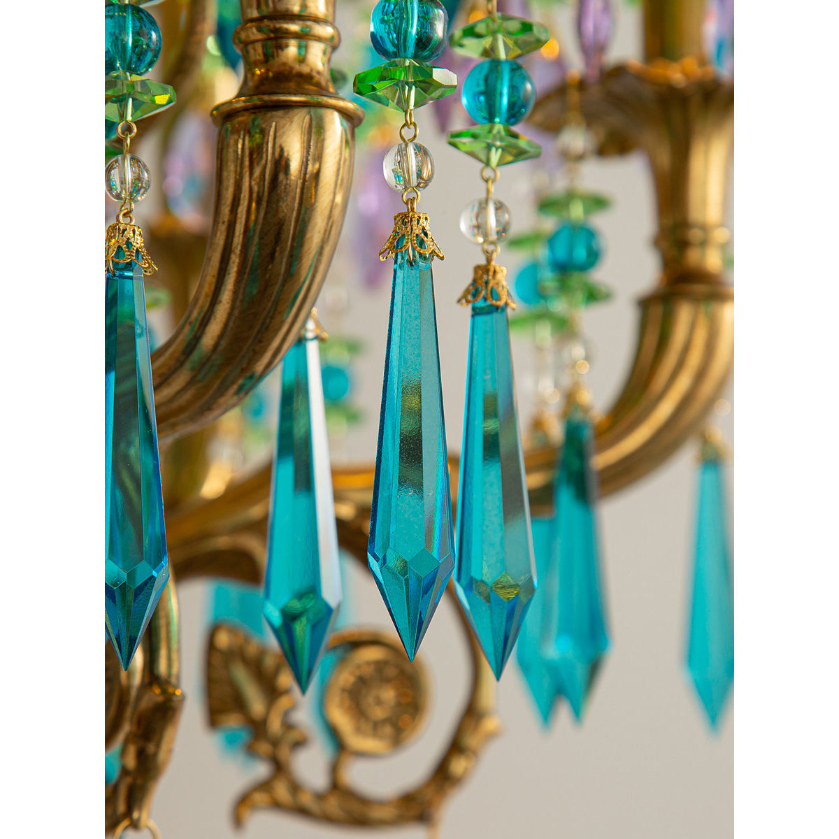 The amethyst and emerald pattern on the fabric lampshade.