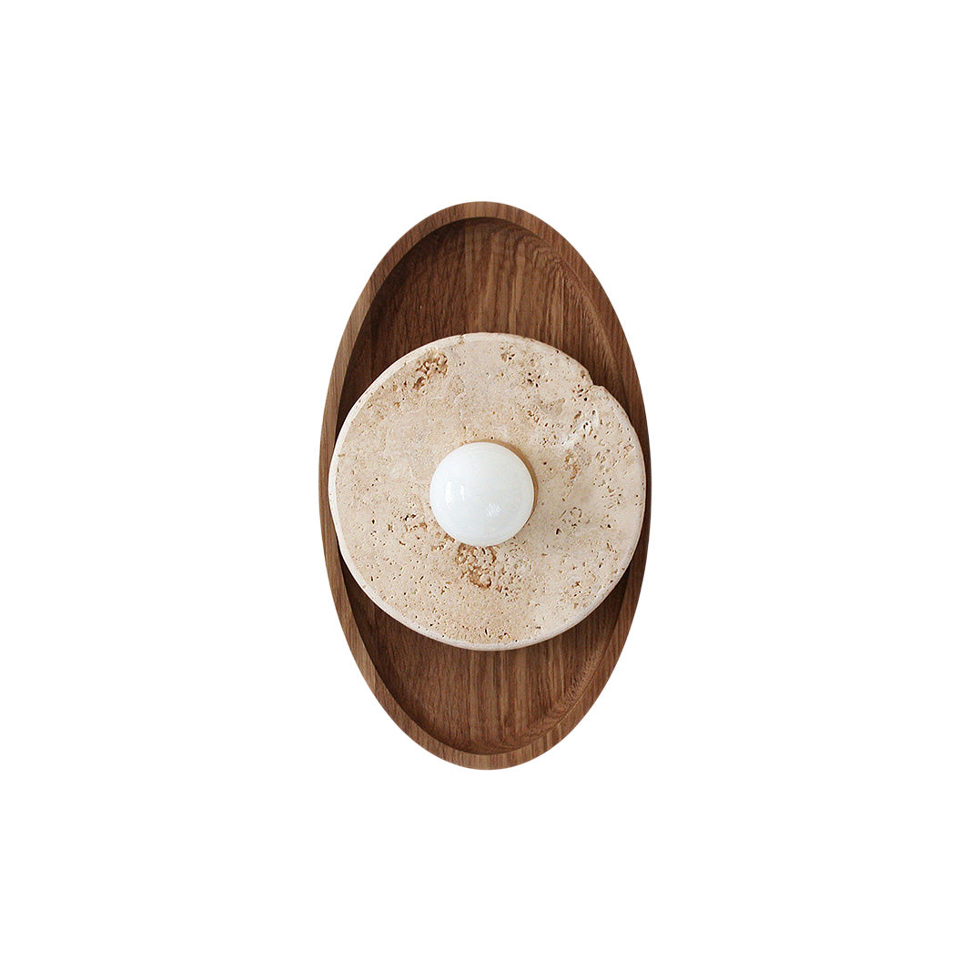 Petra Travertine Wall Sconce with beige stone and walnut backplate.
