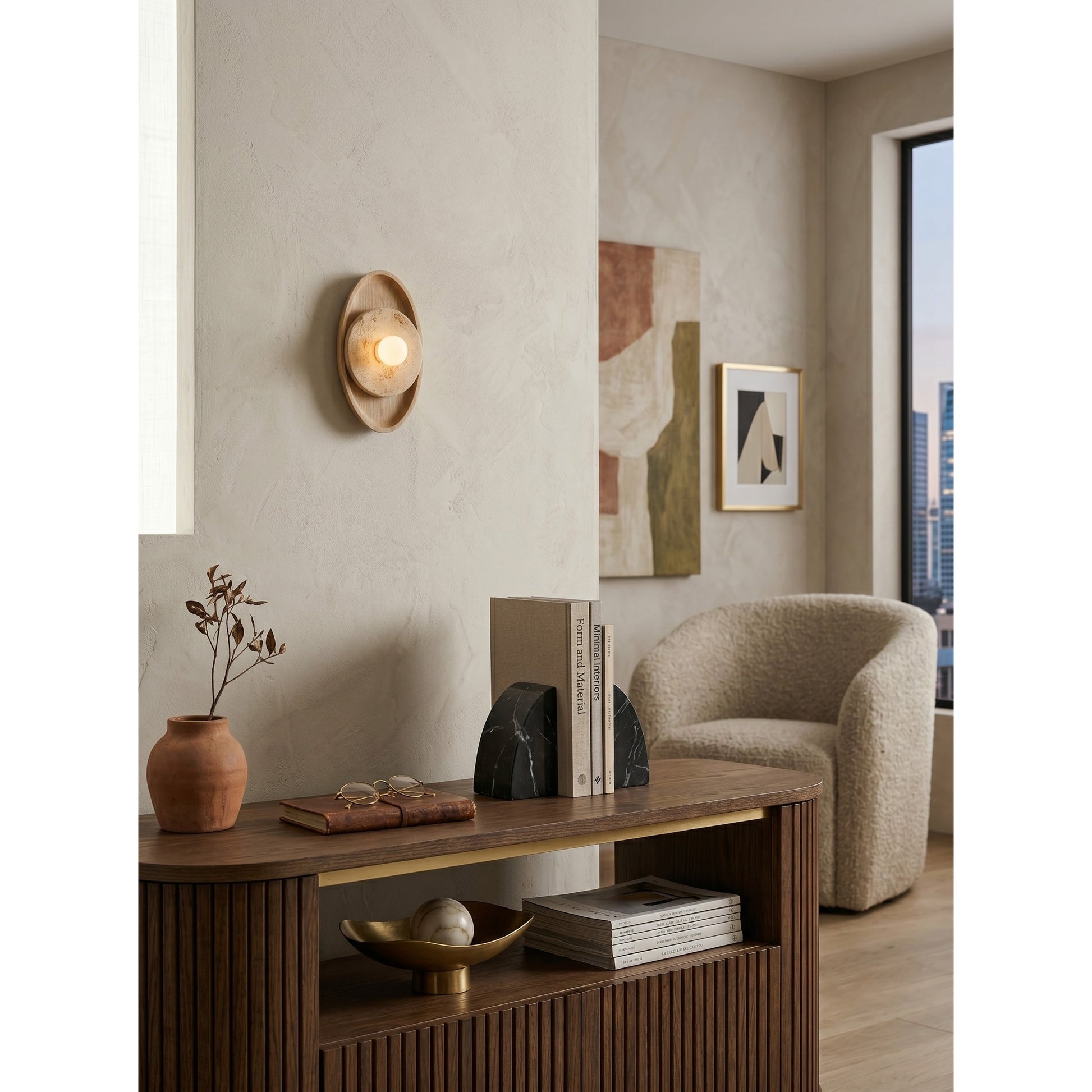 The smaller size variant of the Petra Wall Sconce.