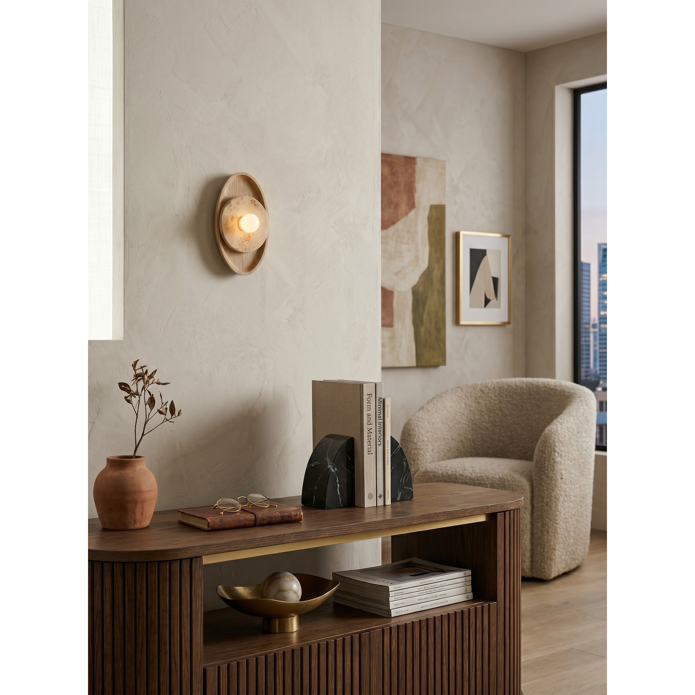 The smaller size variant of the Petra Wall Sconce.