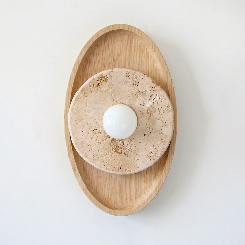 The sconce unlit, showcasing its sculptural quality.