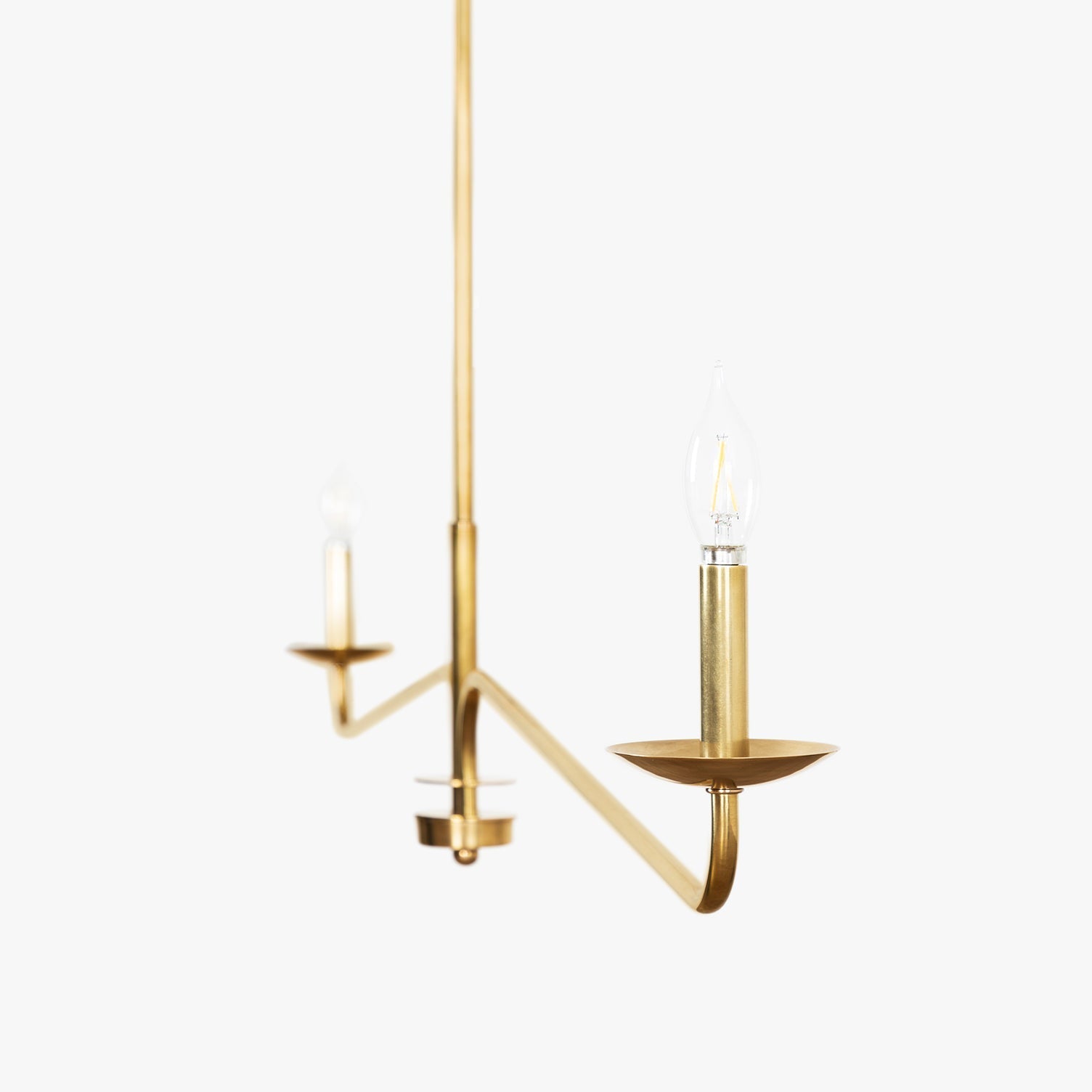 Close-up on the junction of the chandelier's arms.