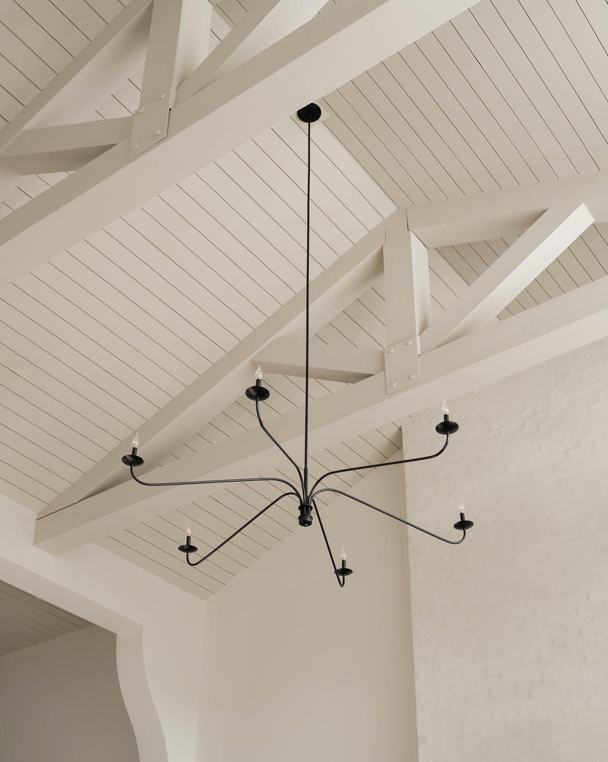 Close-up of the Philomena Chandelier's candle-shaped lights.