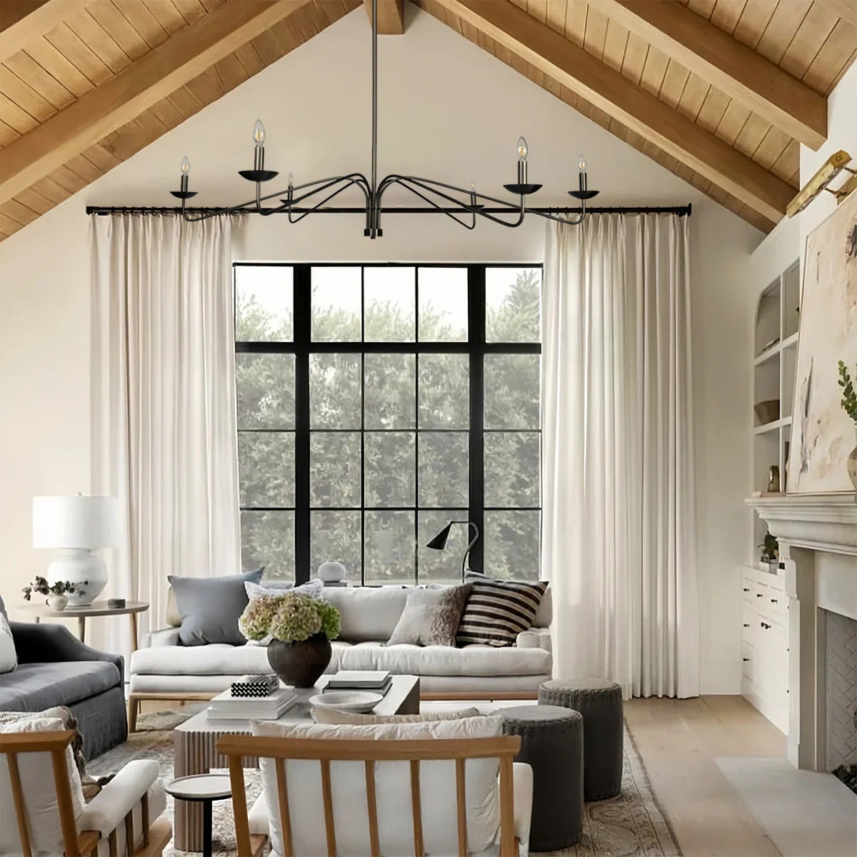 Philomena Chandelier installed in a modern living room setting.