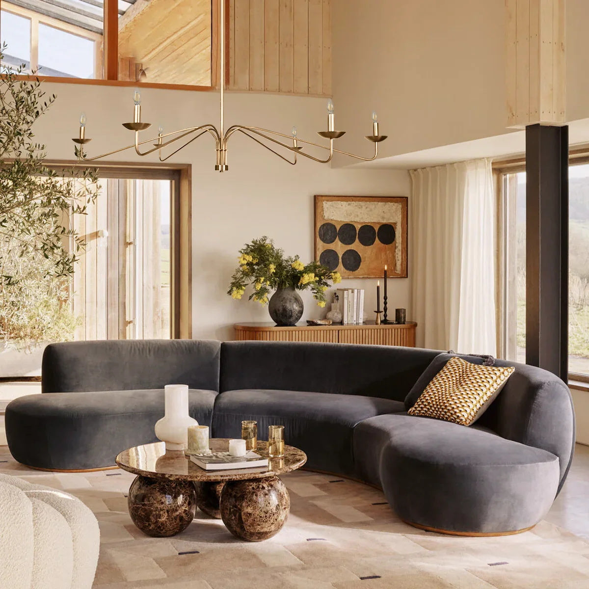 Lifestyle image of the Philomena Chandelier in a dining area.