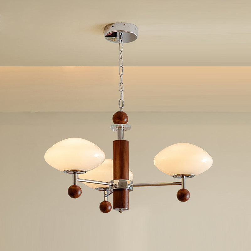 The 3-head version of the Pointed Chandelier against a dark wall.
