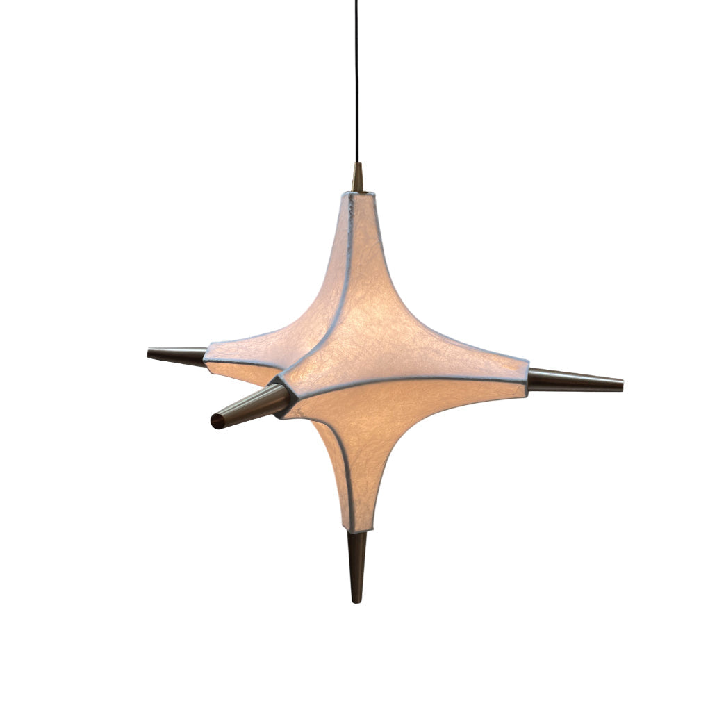 Polar Chandelier with a white imitation mulberry silk shade hanging in a modern living room.