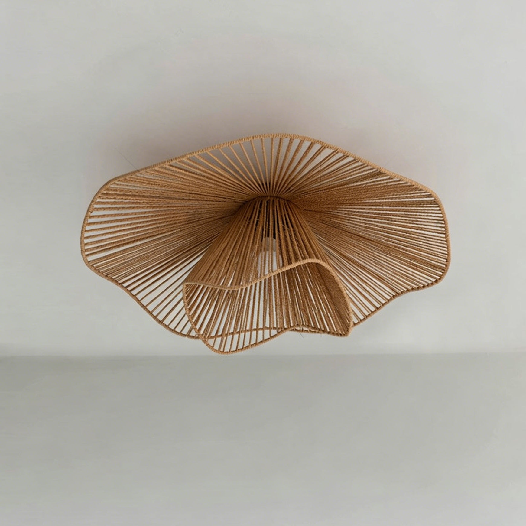Angled view of the large Pontos Rattan Ceiling Light.