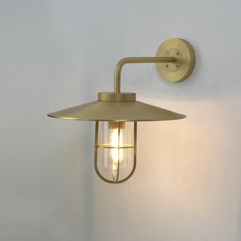Comparison shot of the brass and black finishes of the Portree Wall Light.
