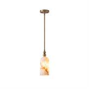 Pratt Alabaster Pendant Lamp with brass stem against a neutral background.
