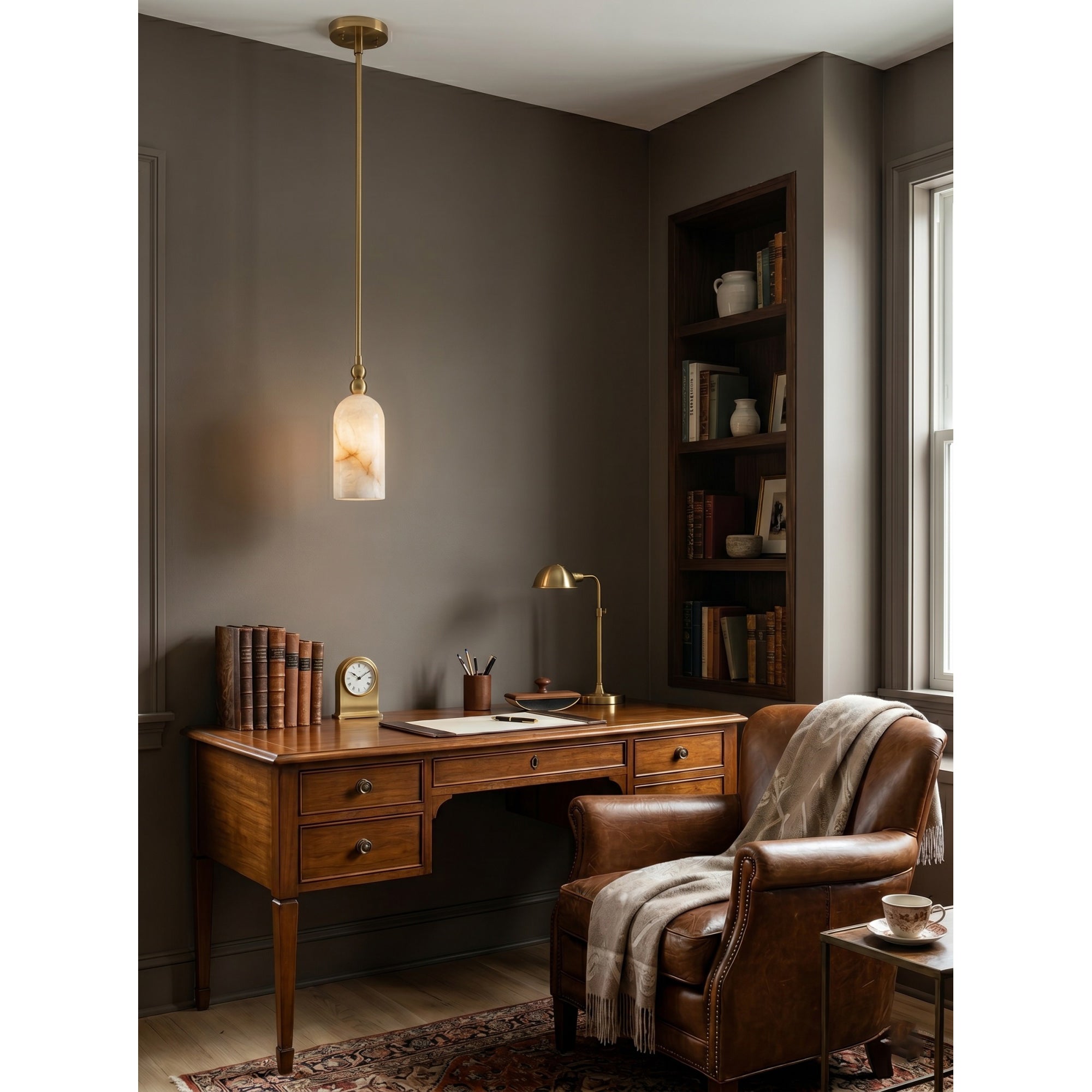 Lifestyle image of the pendant lamp in a minimalist living room setting.