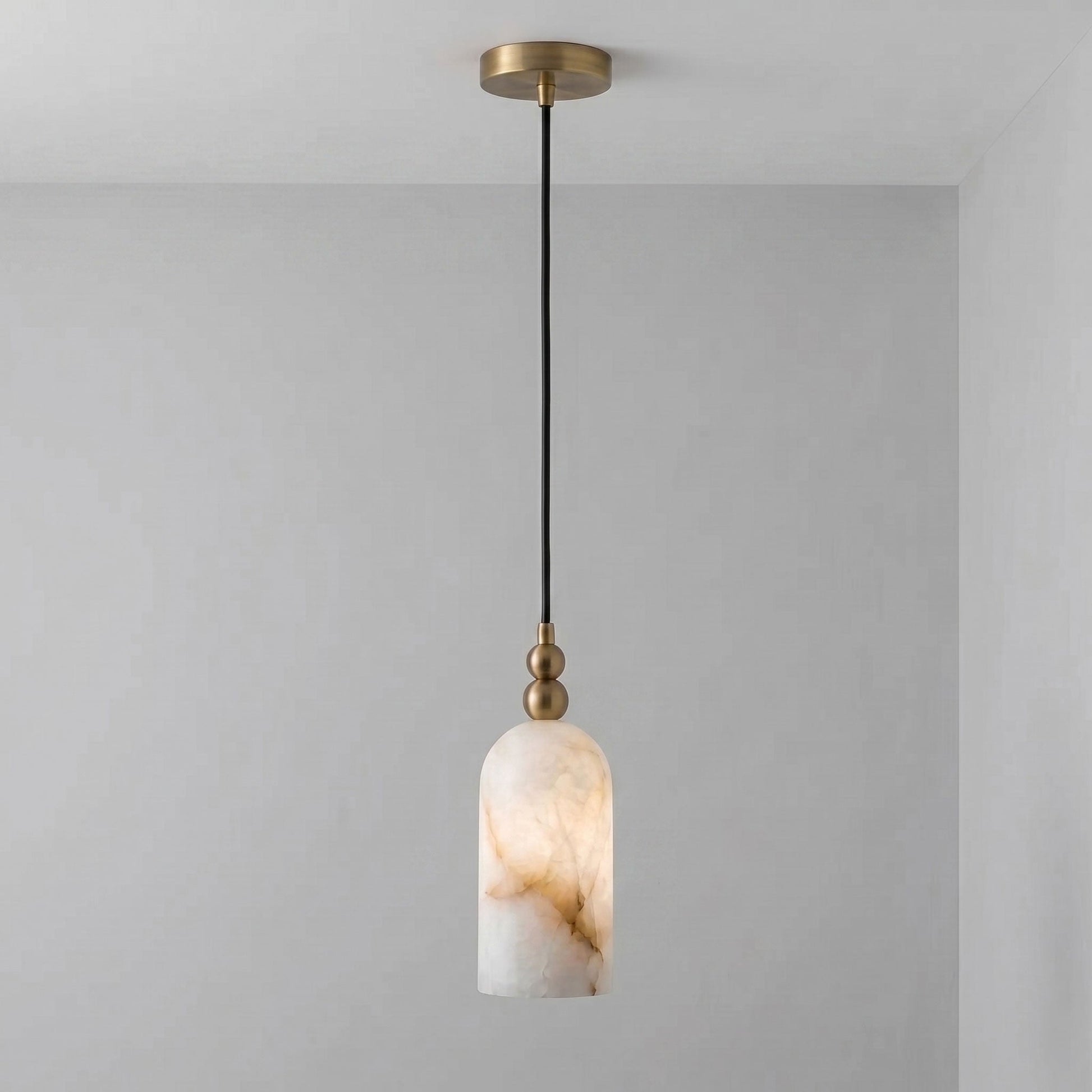 The lamp against a dark wall to emphasize its glowing effect.