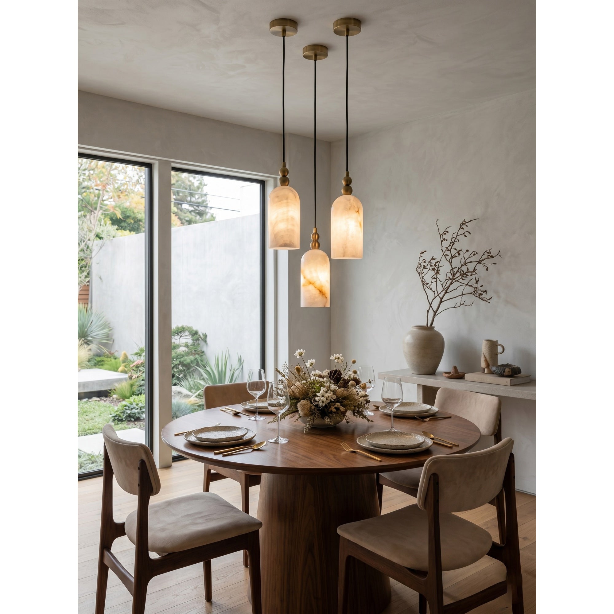 The pendant lamp shown in an entryway foyer, creating a welcoming ambiance.
