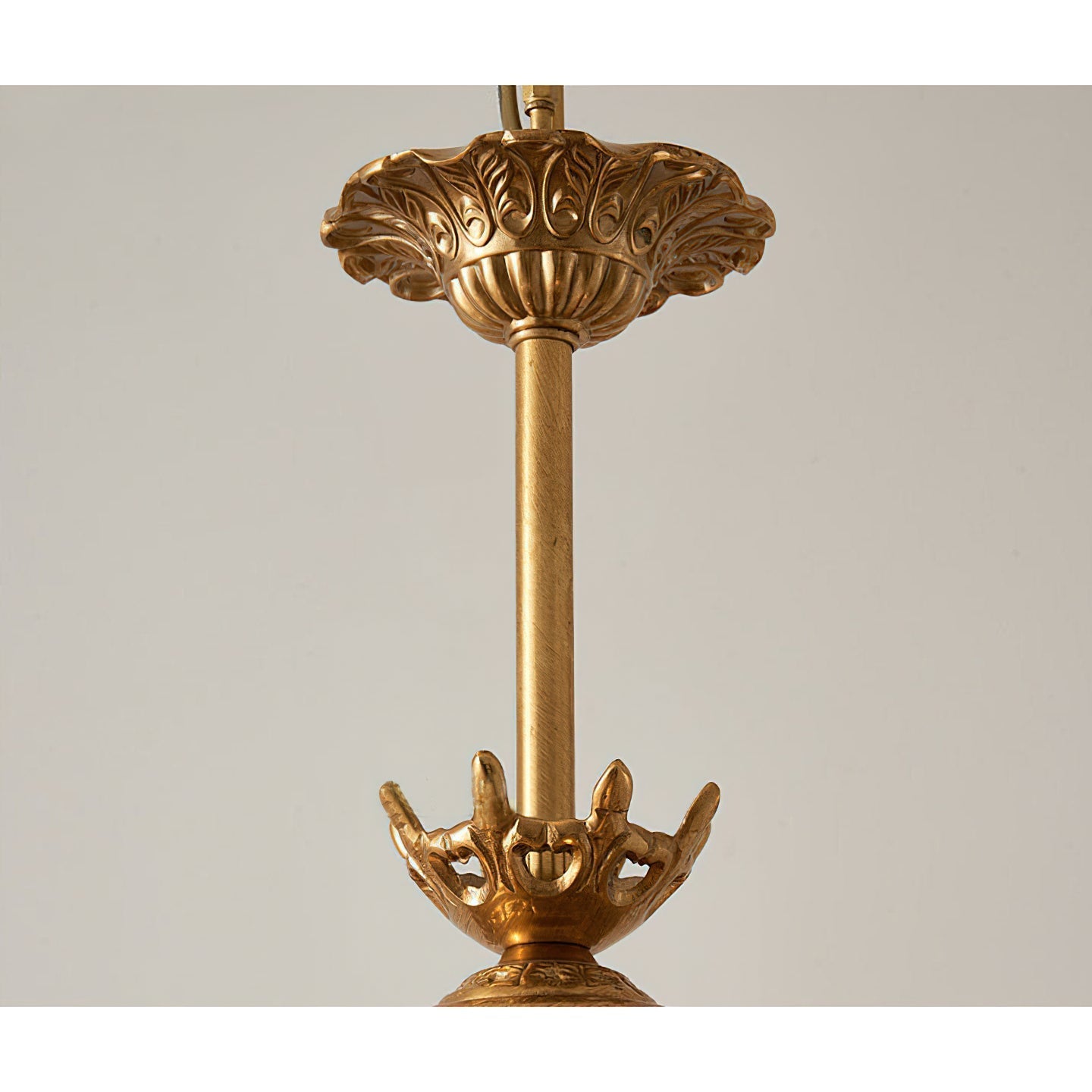 Detail of the brass hanging chain and ceiling canopy.