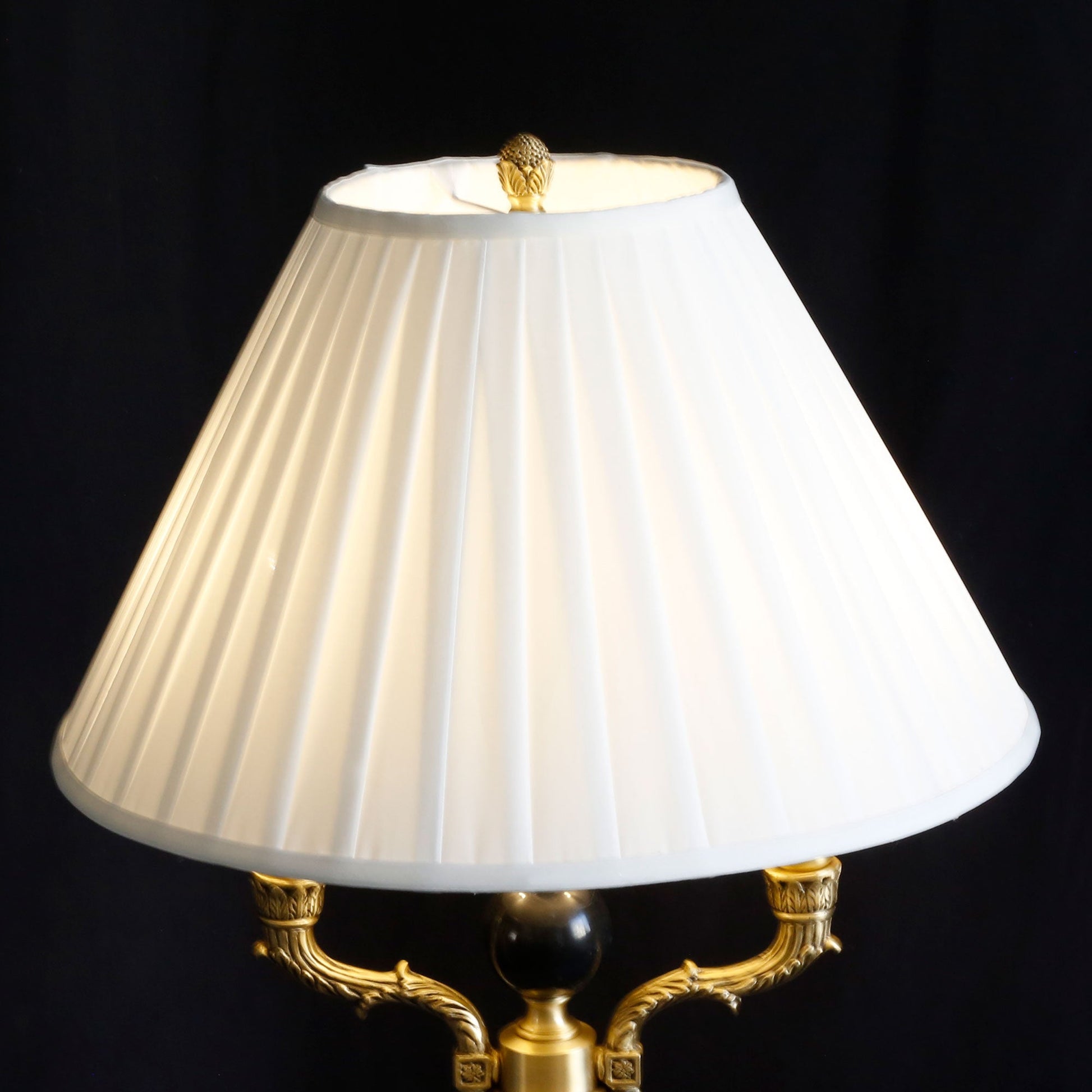 A pair of Ellender Table Lamps flanking a buffet in a dining room.