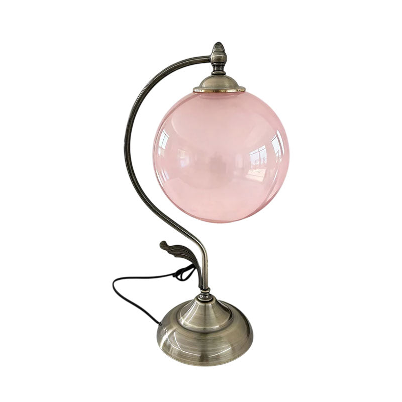 The Evelyn lamp shown with the light turned on, casting a warm and inviting glow.