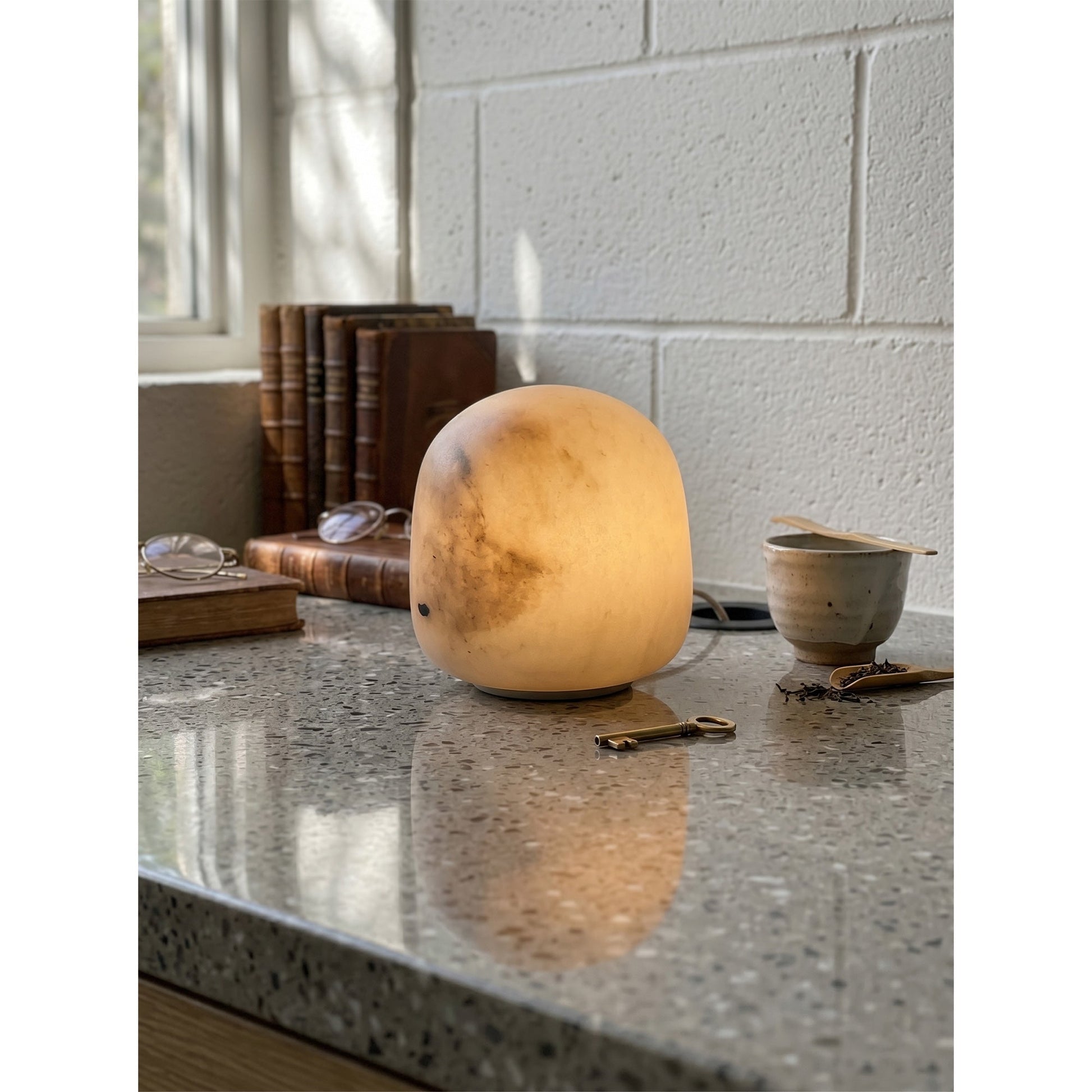 The 'Petite - Short' model of the alabaster portable lamp.