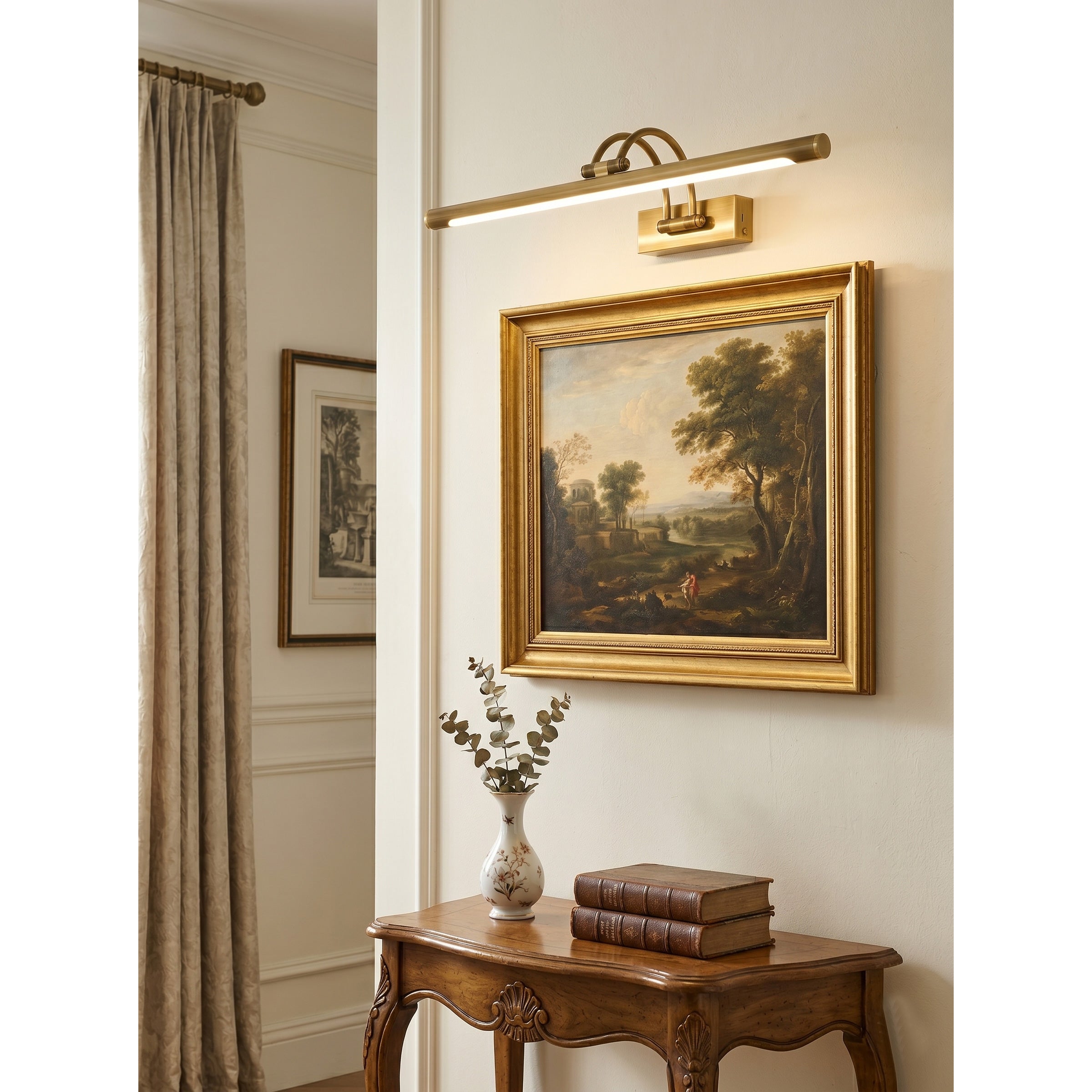 Alton rechargeable wall lamp in antique brass finish, angled view.