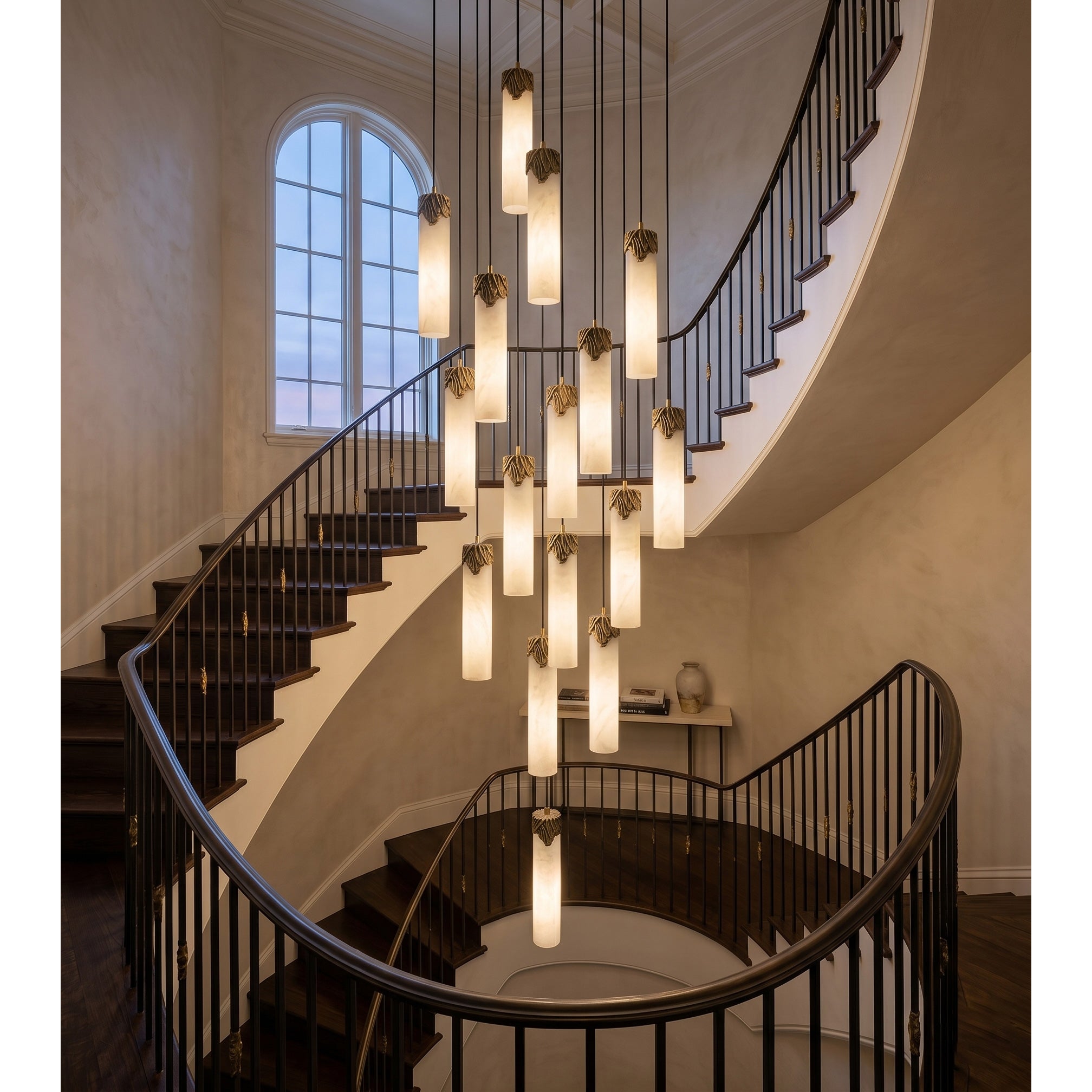 The 7-head Lyra chandelier in a living room with high ceilings.
