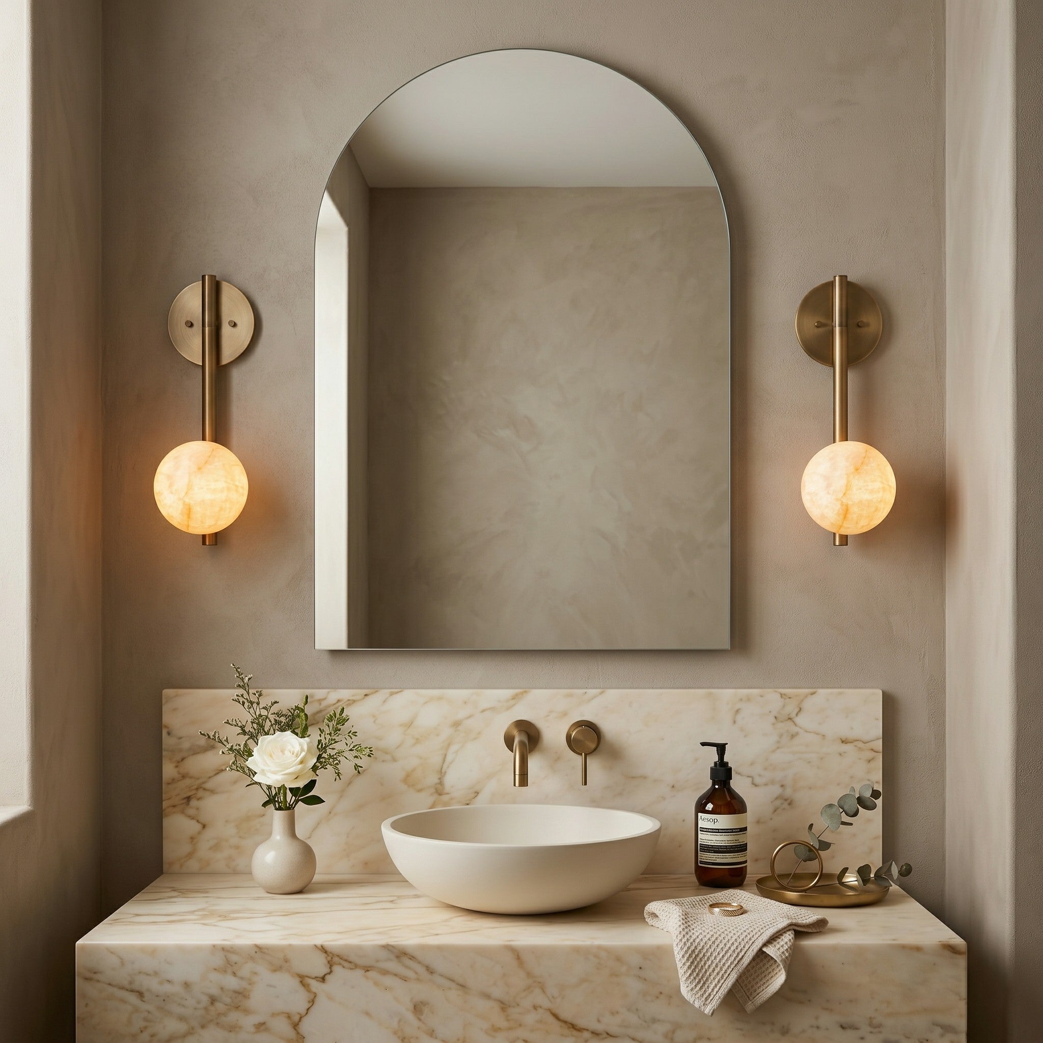 The wall sconce providing ambient light in a hallway.