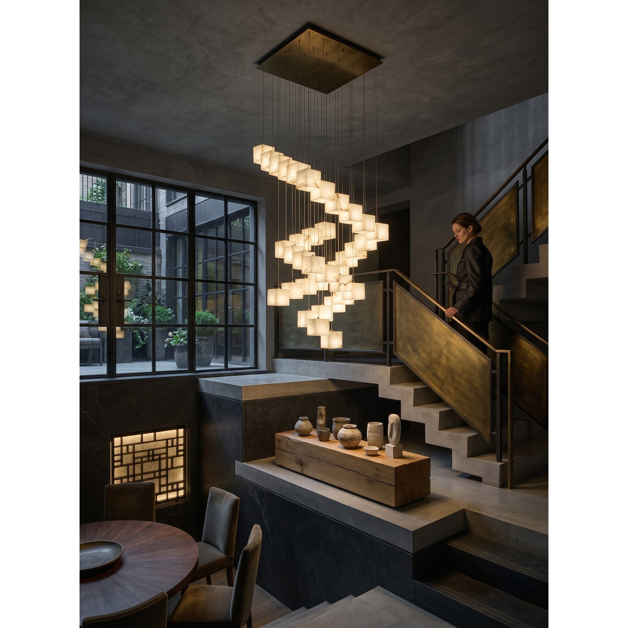 A single alabaster cube component of the chandelier, showing its texture.