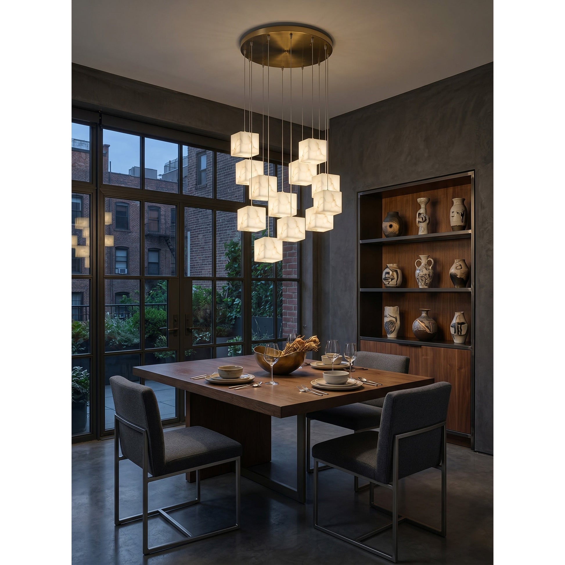 Alabaster Box Chandelier shown in a sophisticated staircase setting.