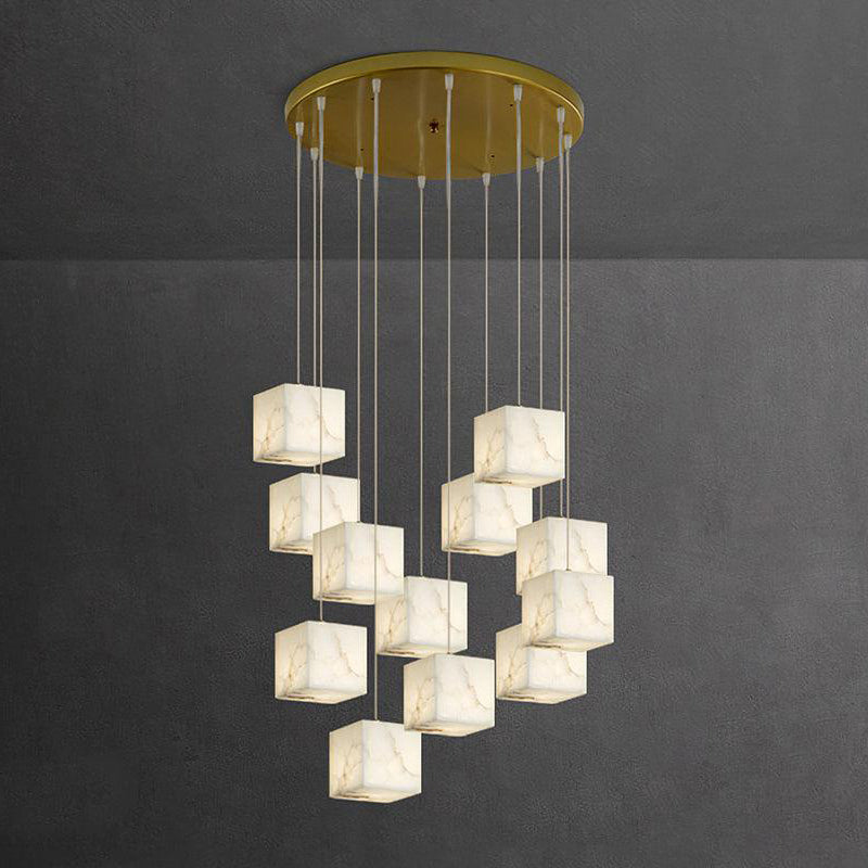 Detail of the connection between the suspension wire and an alabaster cube.