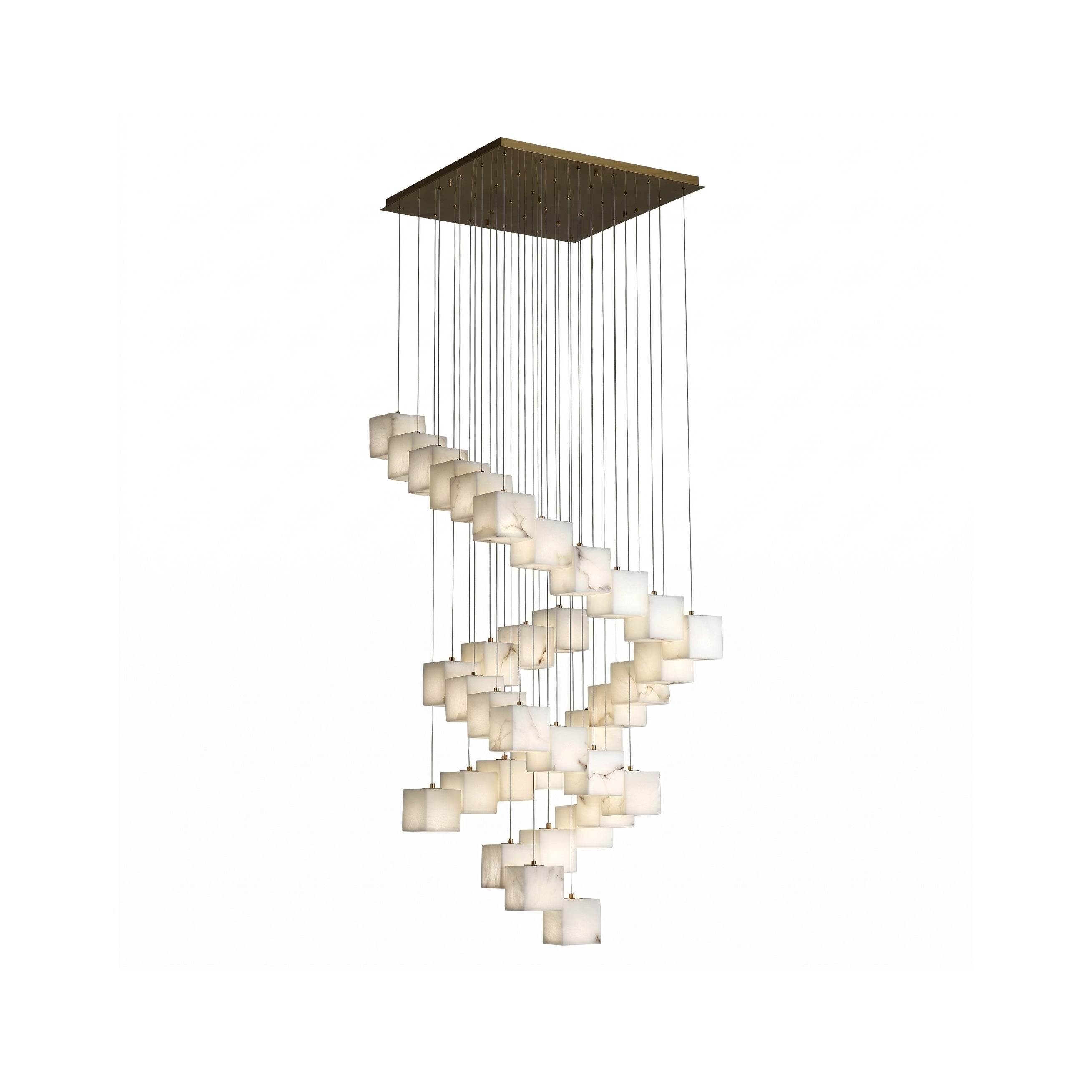 The chandelier shown against a dark background to emphasize its warm glow.