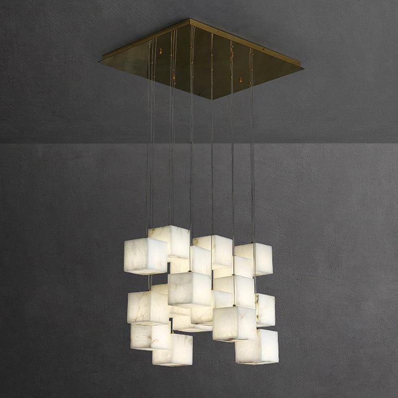 The chandelier casting a soft glow on a nearby wall.