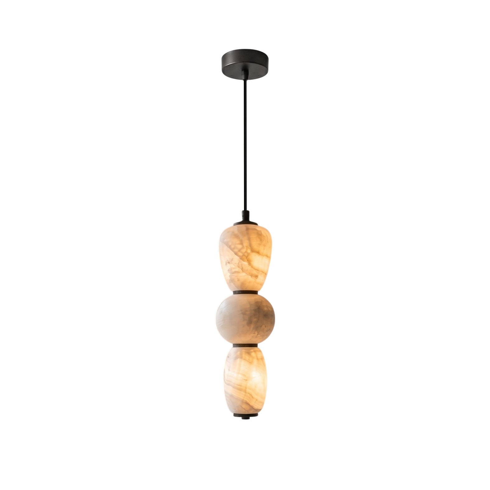 Alabaster Pendulous Pearl Pendant Lamp in a minimalist living room.