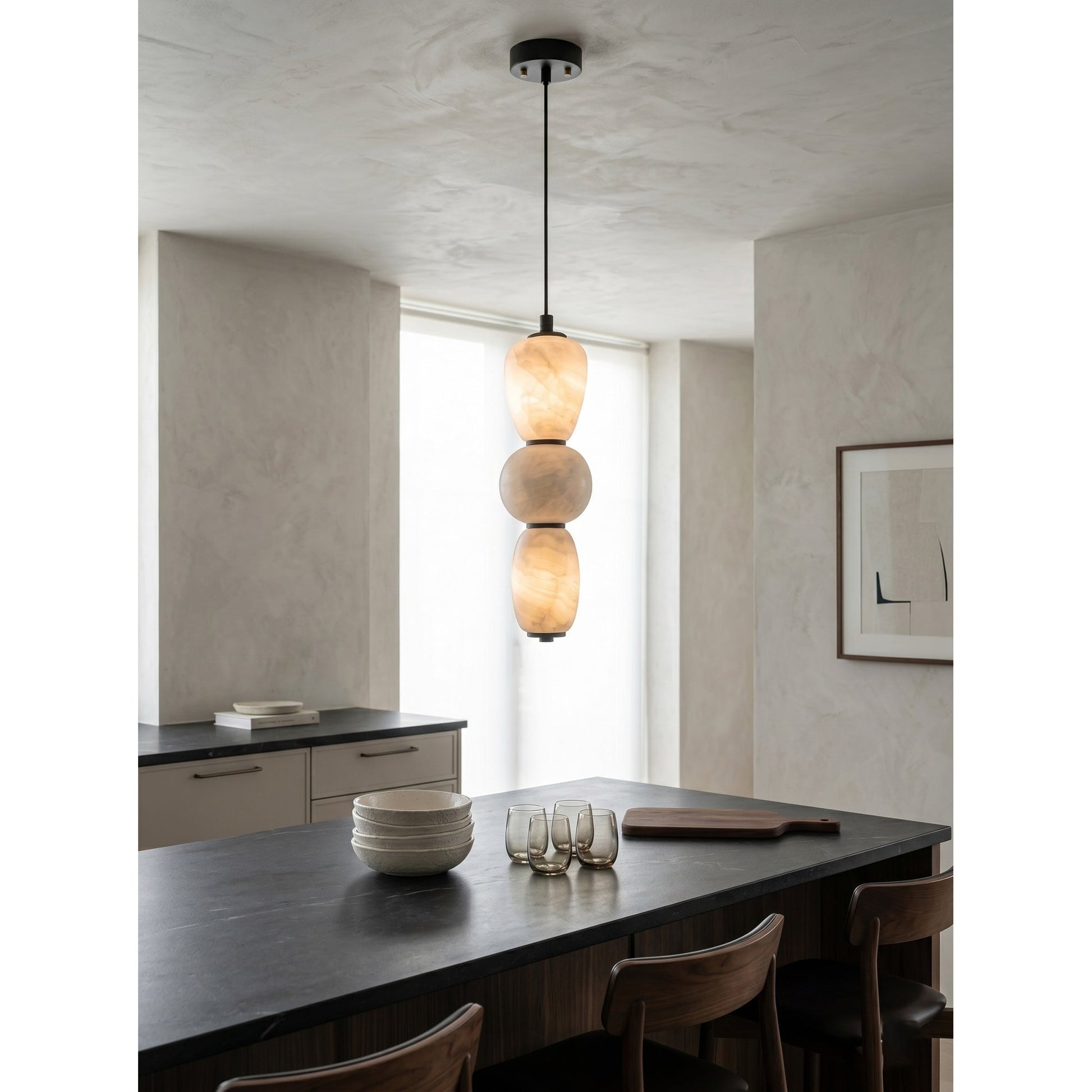 Side profile of the stacked alabaster pebble design.