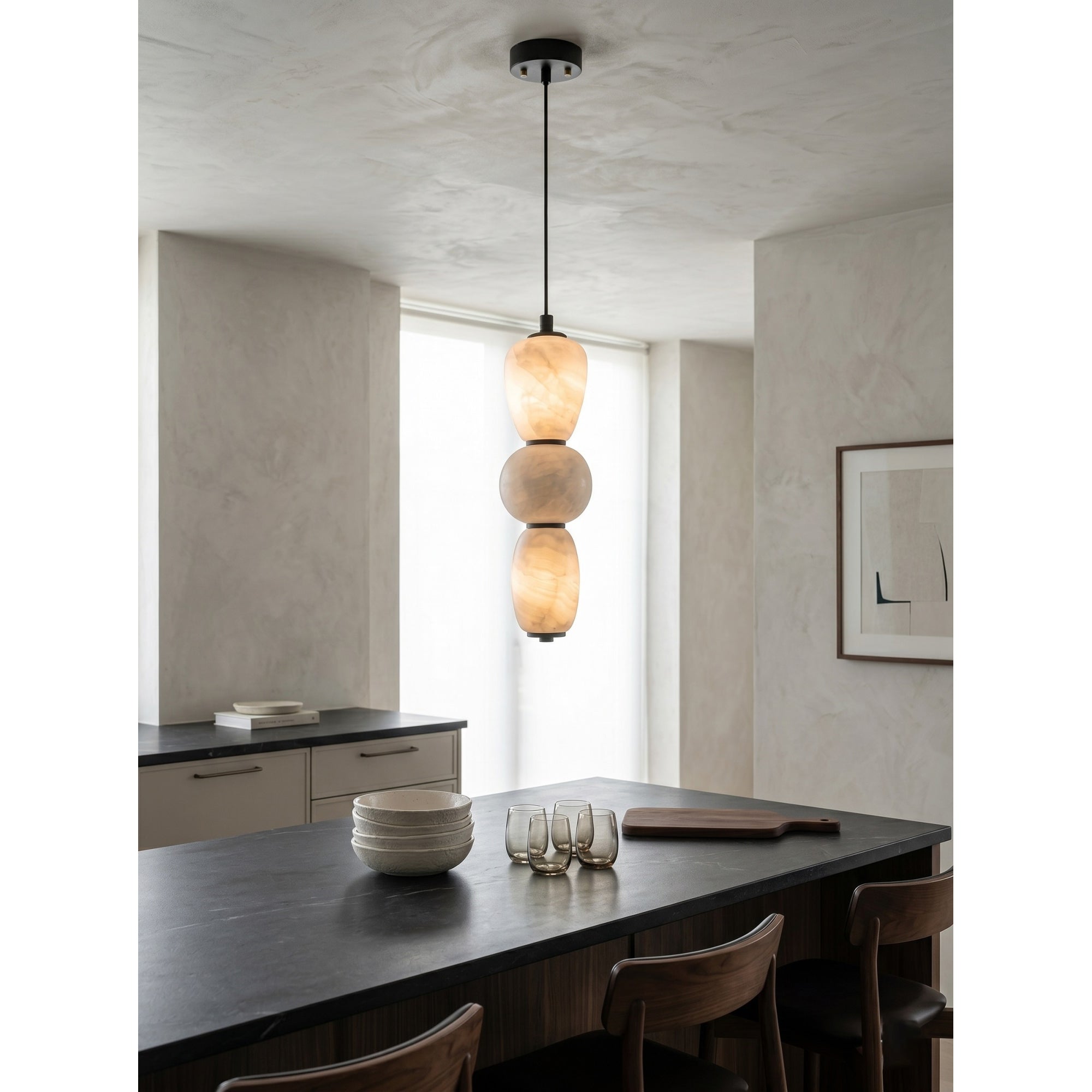 Side profile of the stacked alabaster pebble design.