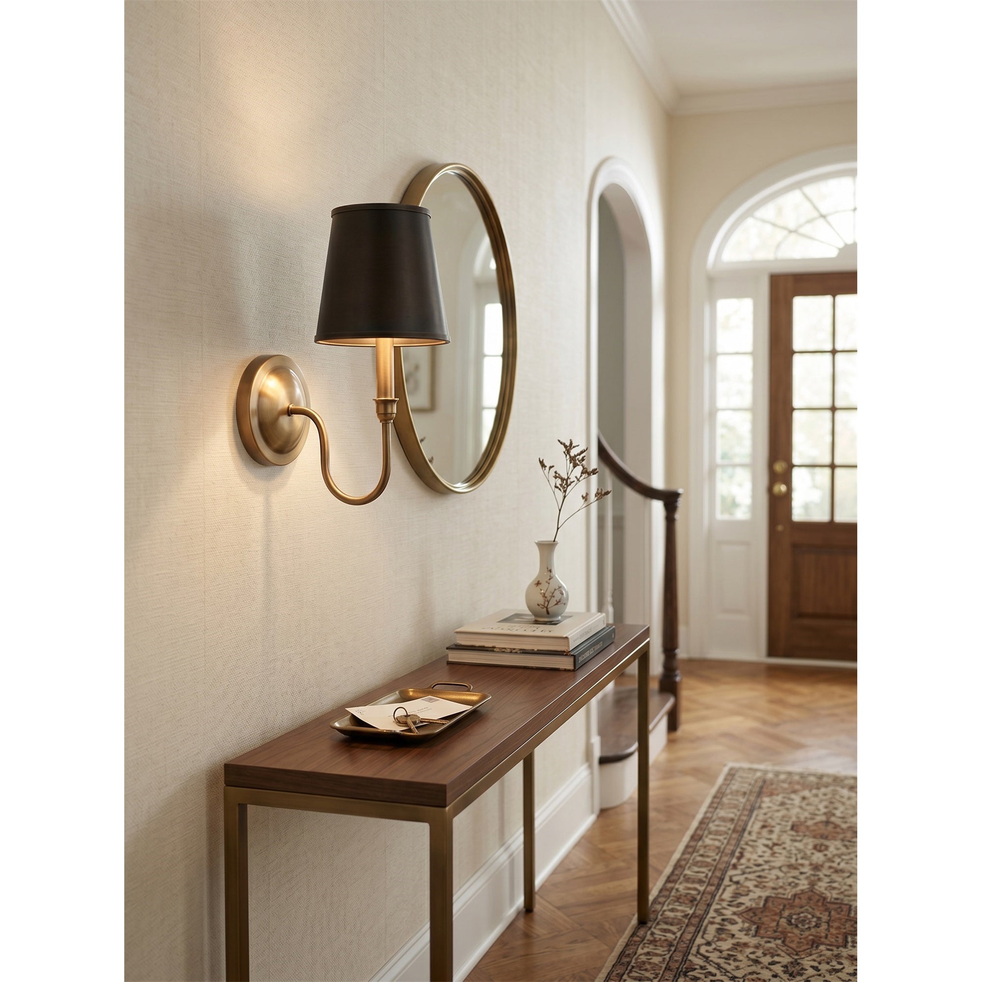 Lifestyle image featuring the Alden Wall Sconce in a formal hallway.
