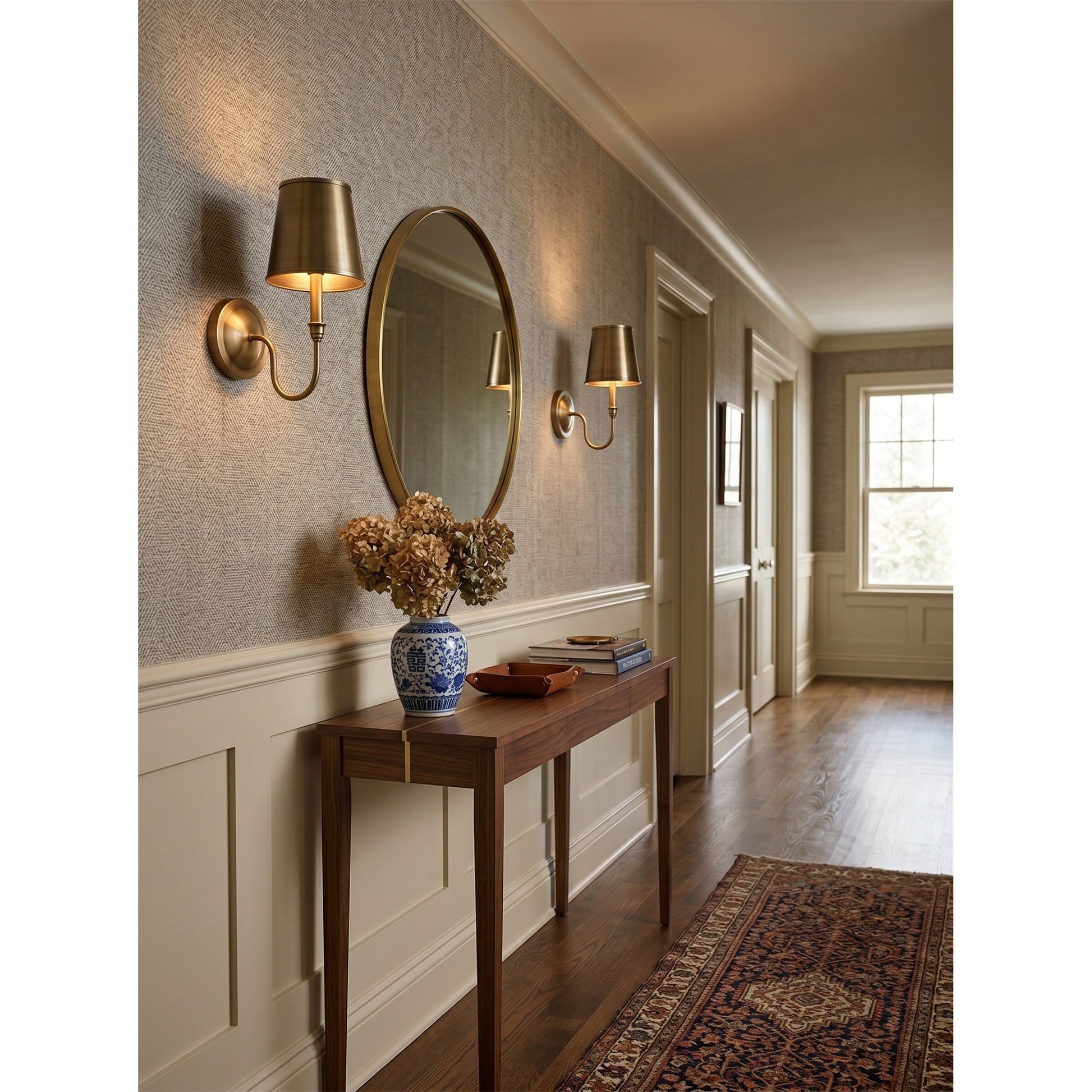The Alden Wall Sconce with its included mounting hardware.