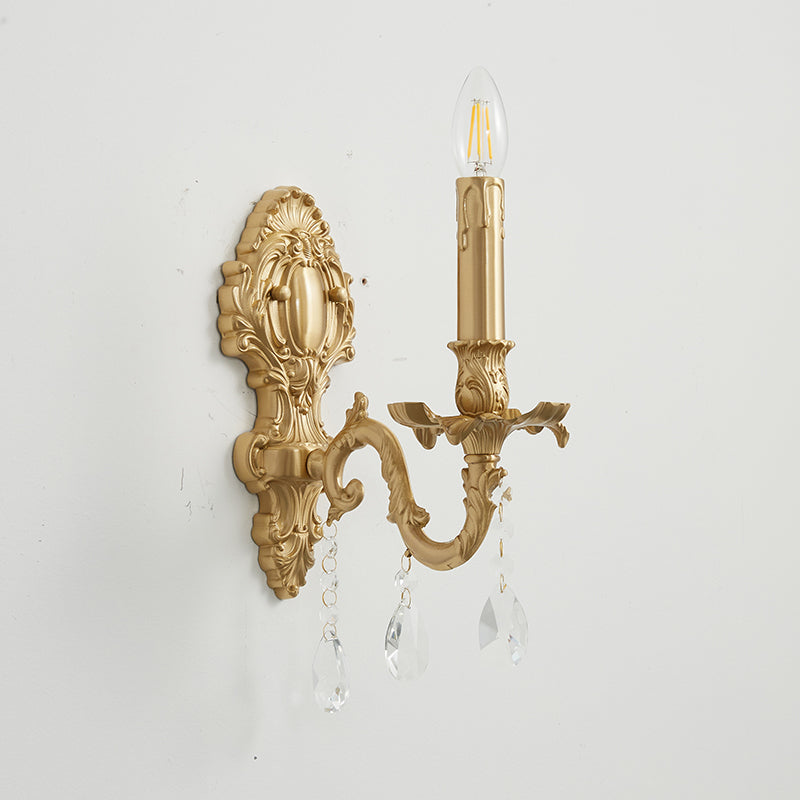 The Aldepo Wall Sconce casting light patterns on a wall.
