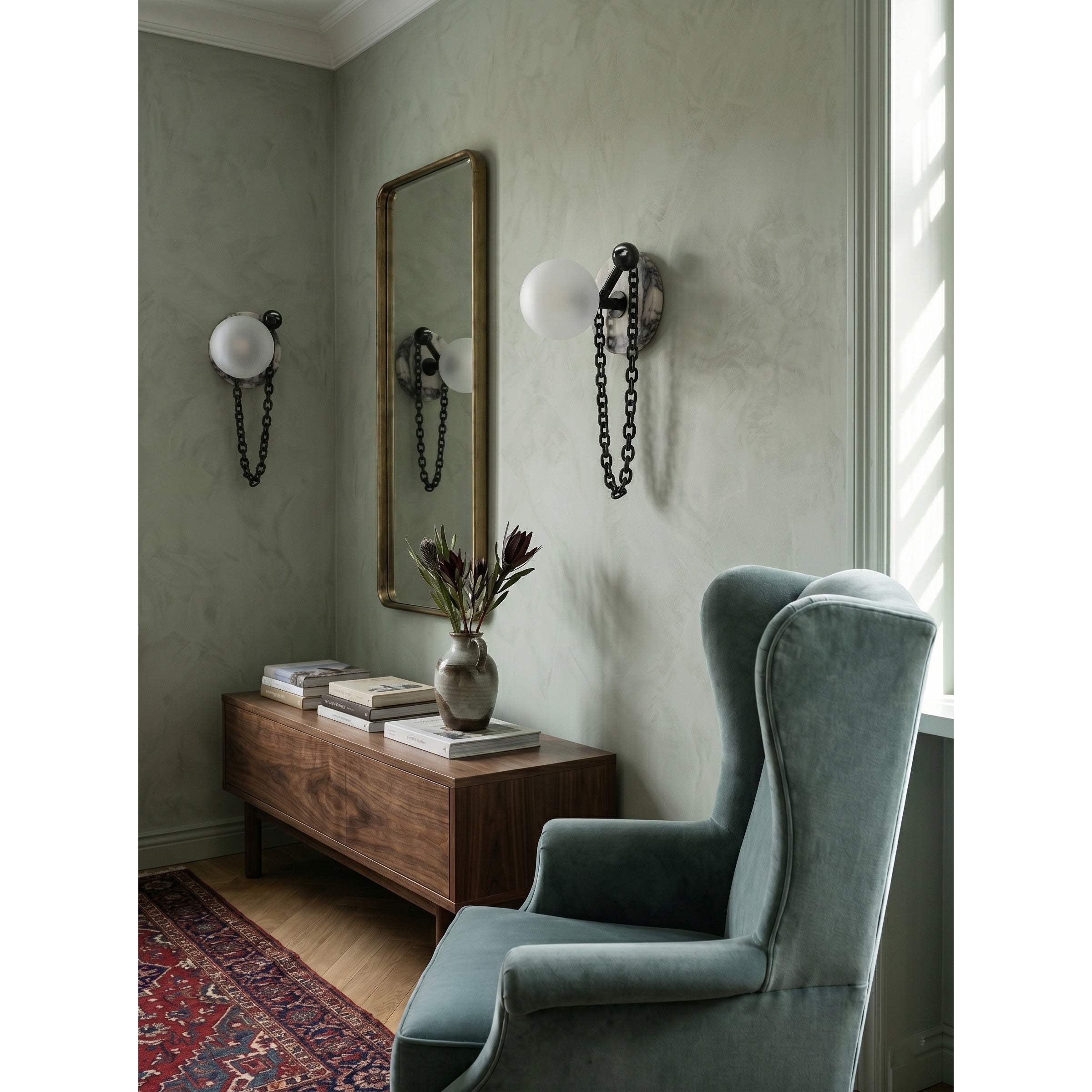 Side profile of the Alla Wall Sconce showcasing its sculptural form.