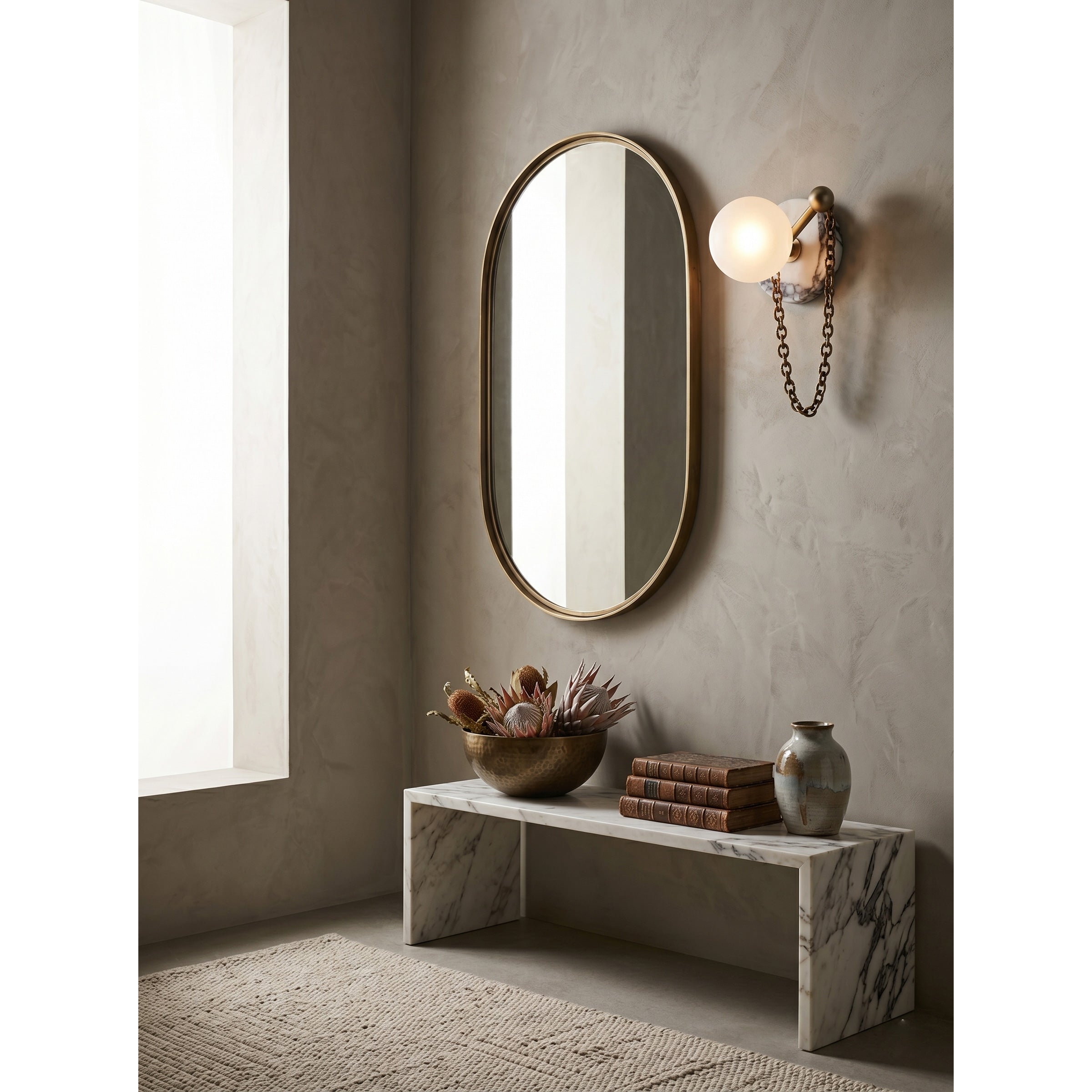 Alla Wall Sconce in a hallway, providing elegant accent lighting.