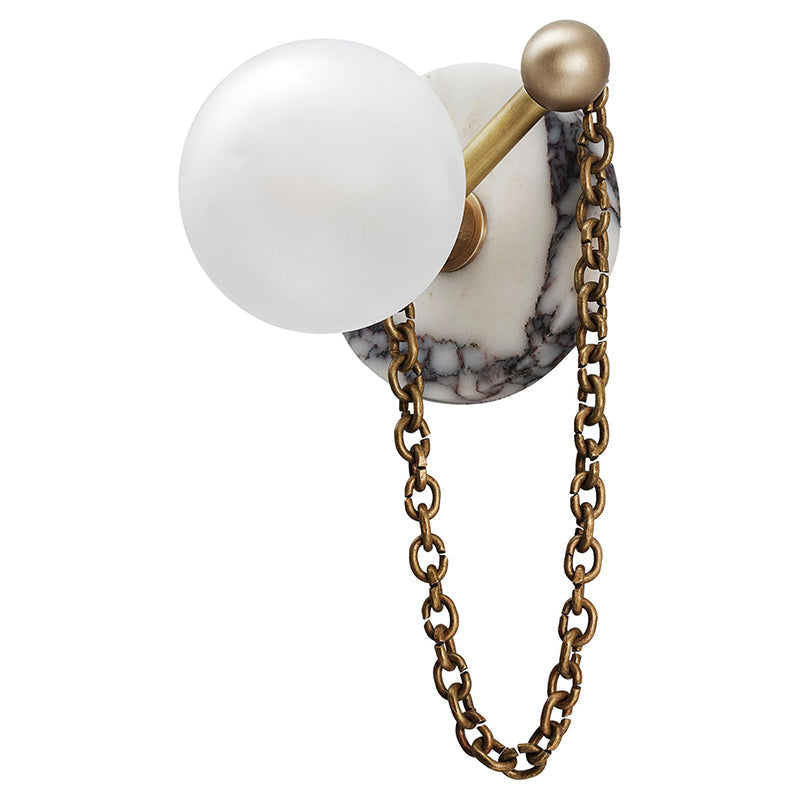 Lifestyle image of the Alla Wall Sconce in a chic entryway.