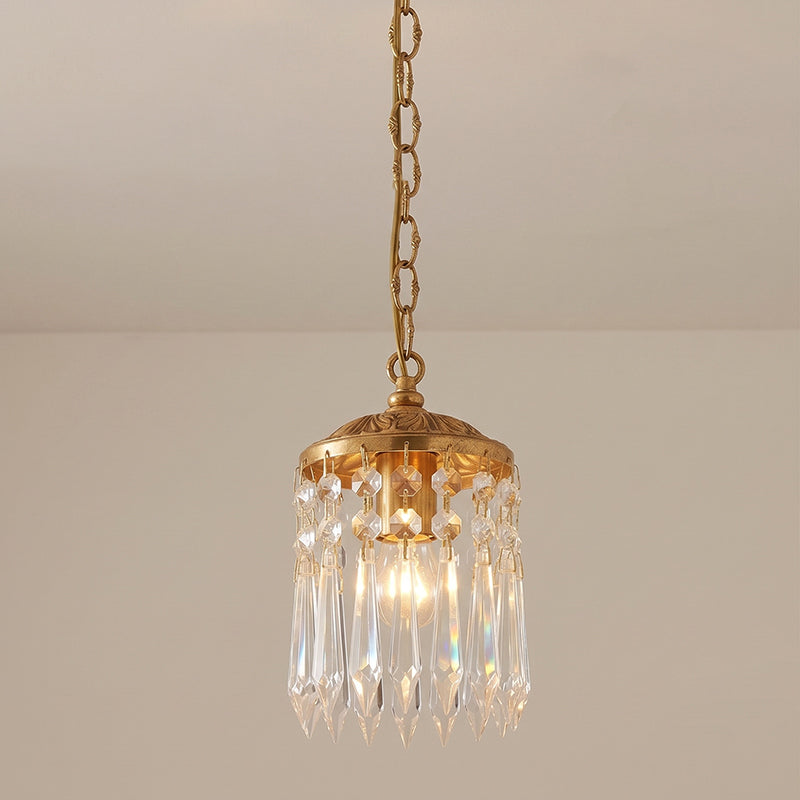 The complete pendant lamp with its brass canopy and cord.
