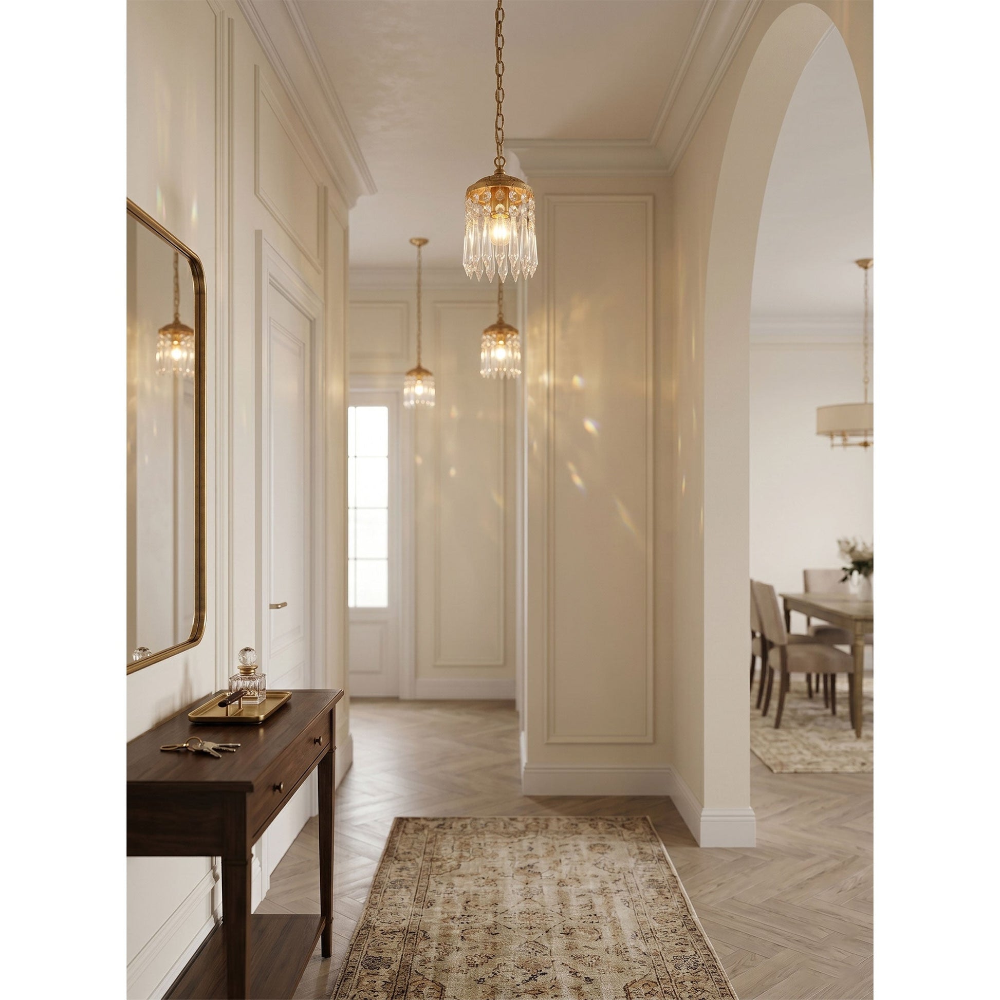 The mini crystal pendant lamp hanging in a chic powder room.