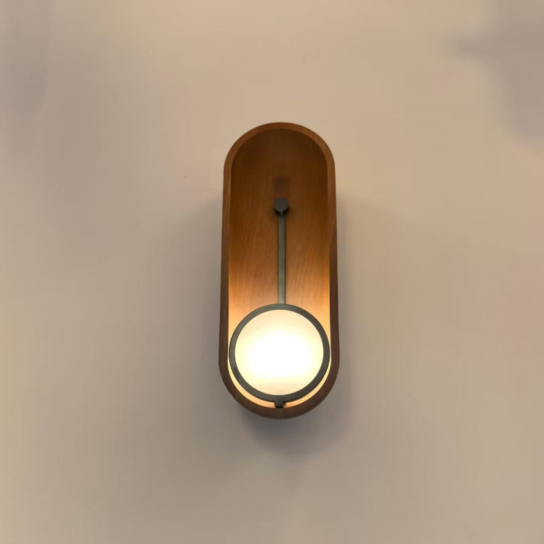 Close-up on the clear glass shade and the G9 socket inside.