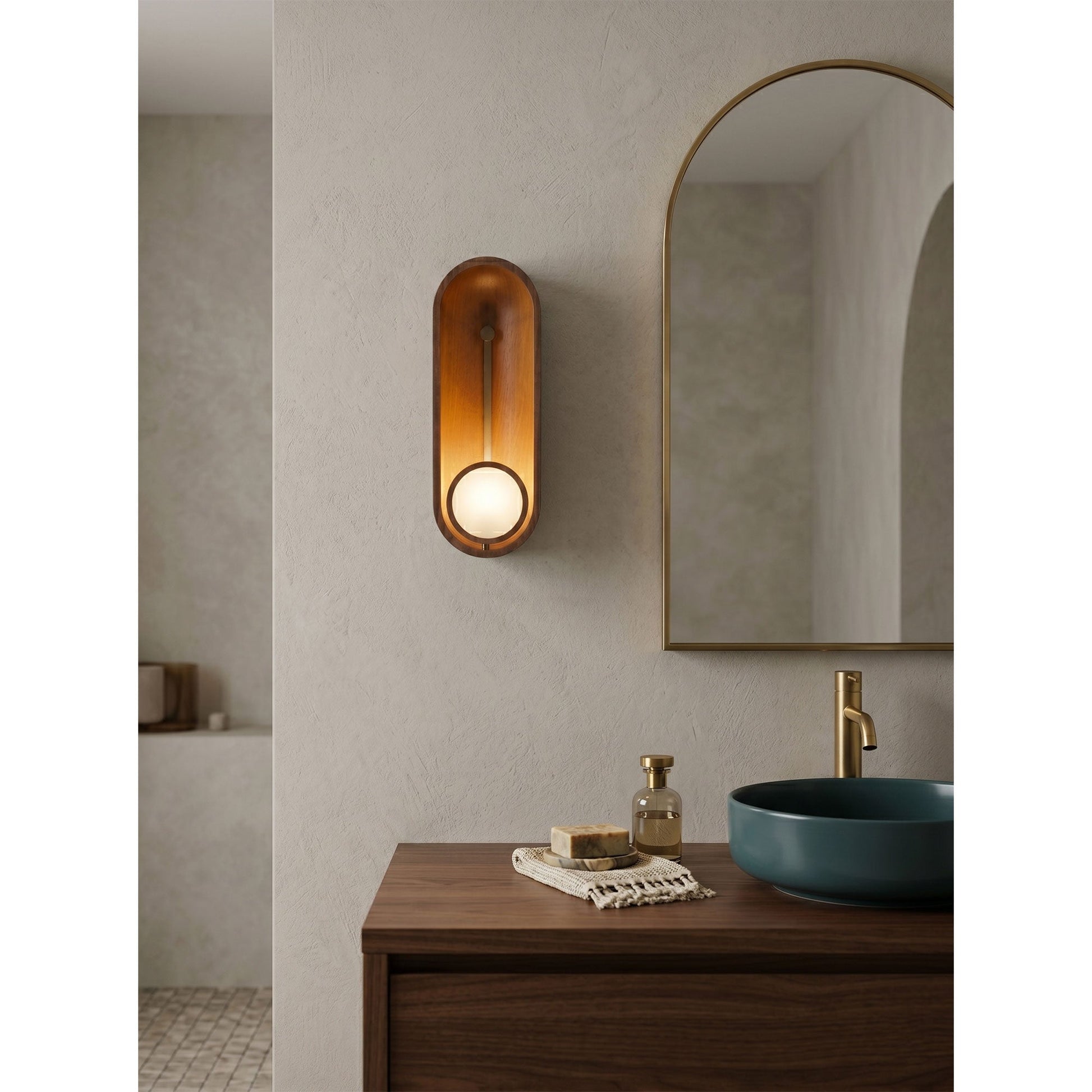Two Aperture Wall Sconces flanking an entryway console table.