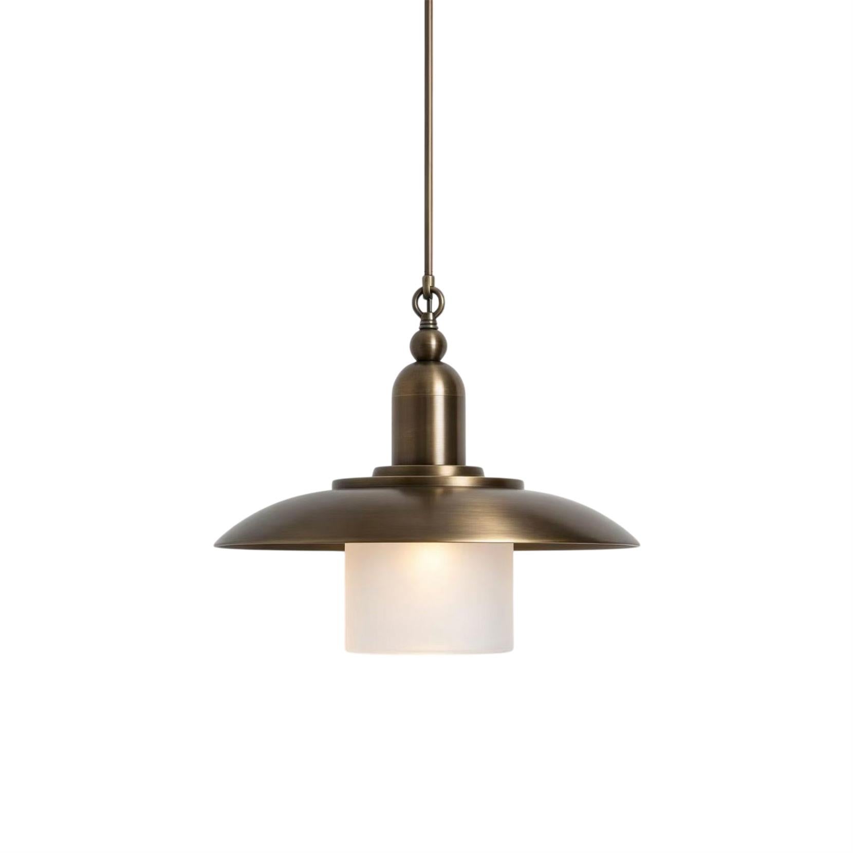 Argent Pendant Lamp in aged brass finish.