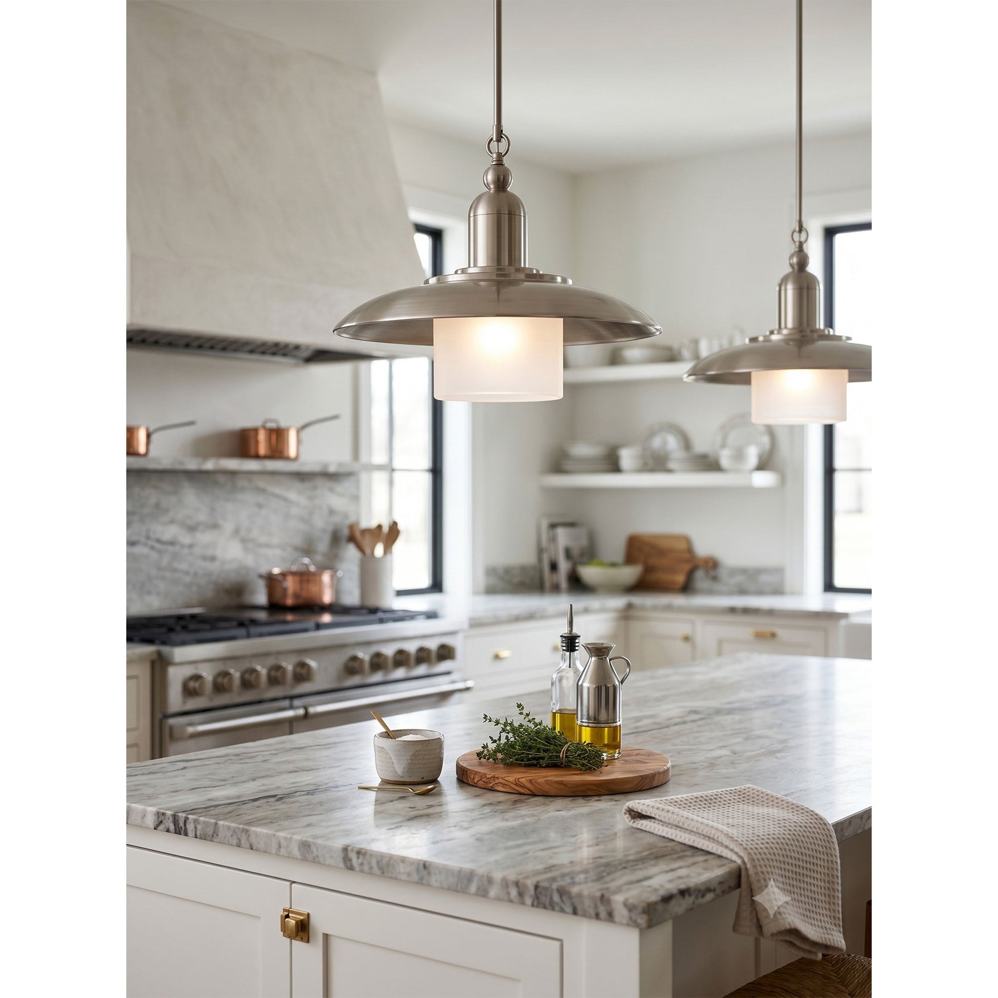 Argent Pendant Lamp in aged brass finish, angled view.