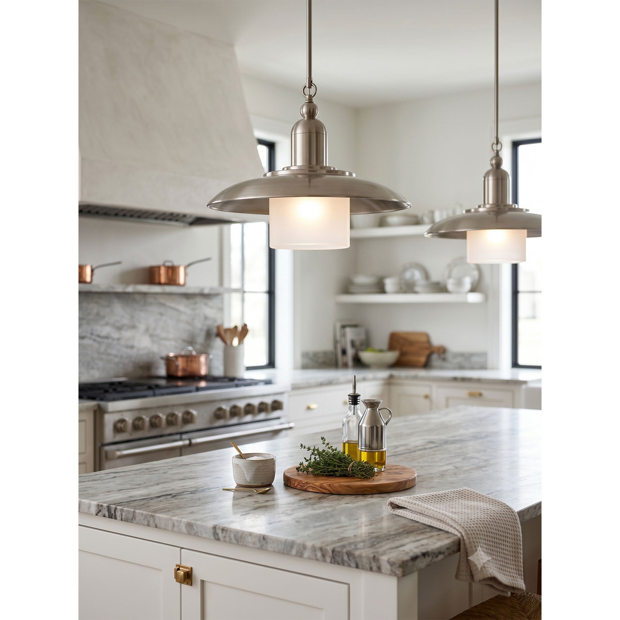 Argent Pendant Lamp in aged brass finish, angled view.