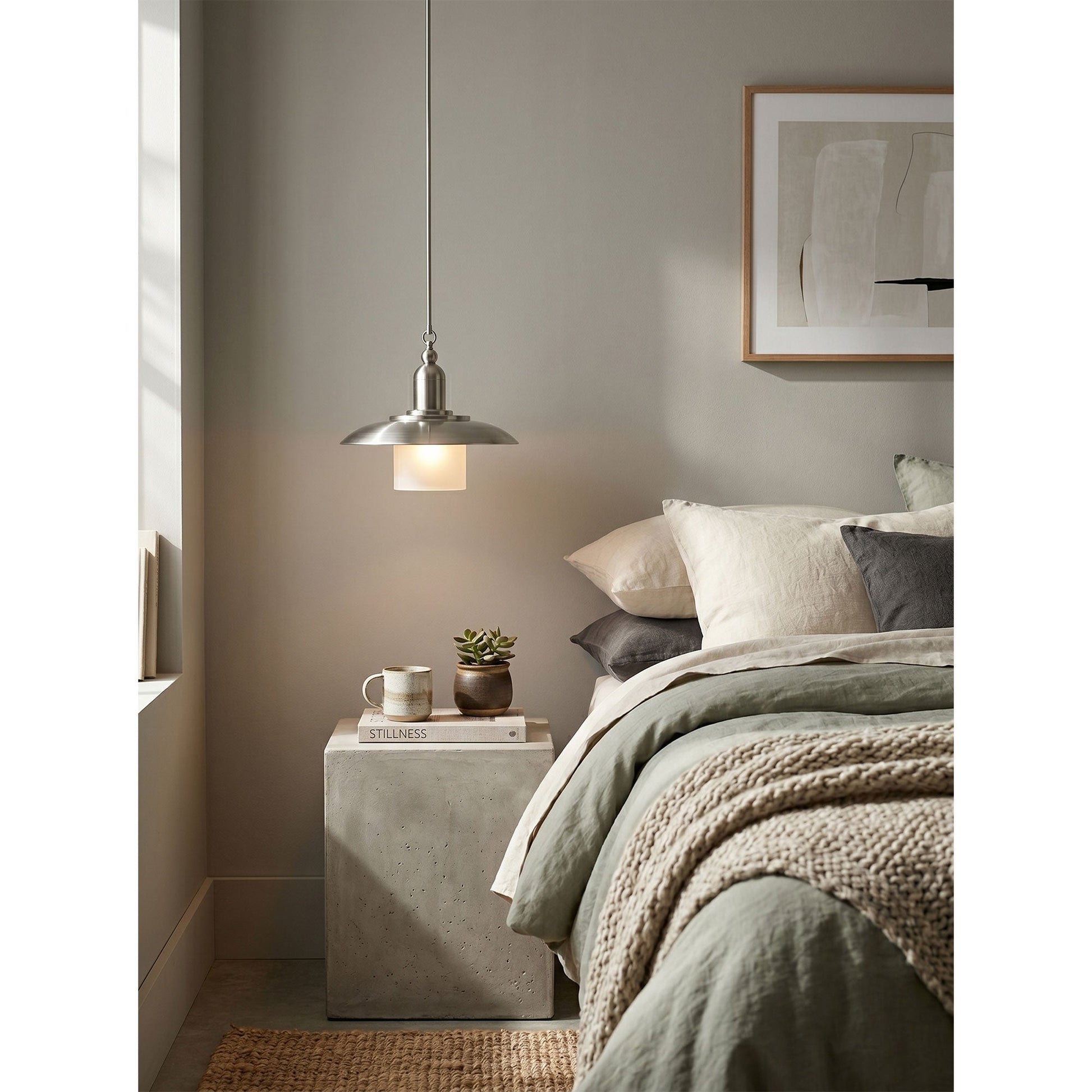 Argent Pendant Lamp, black finish, in a minimalist setting.