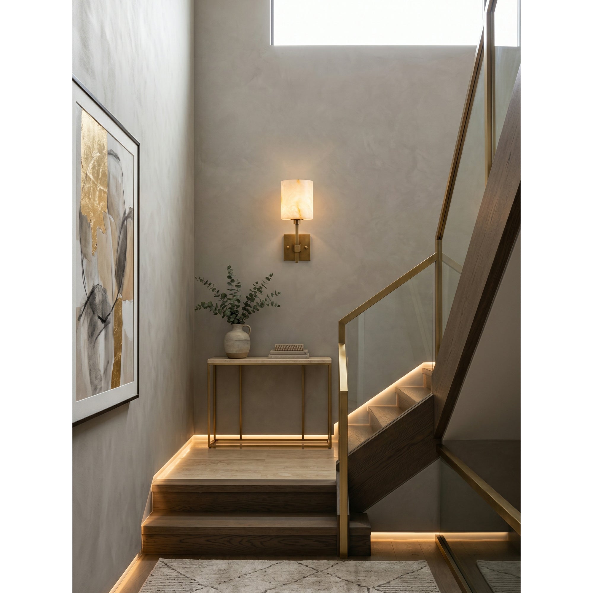 Unlit view of the sconce to showcase the brass and alabaster materials.