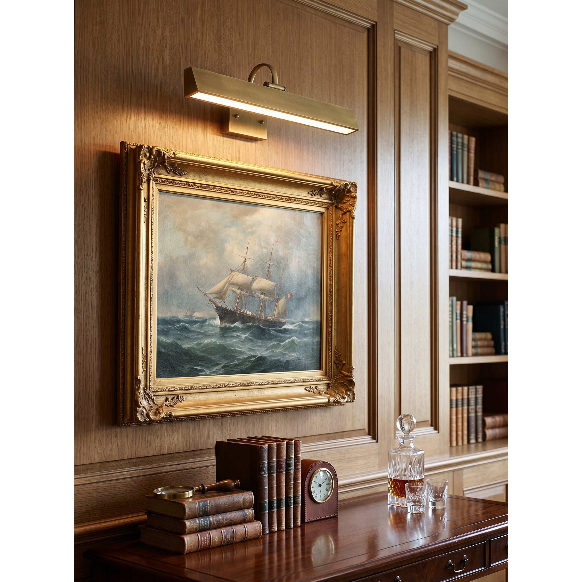 Arti Brass Wall Sconce in antique brass finish.