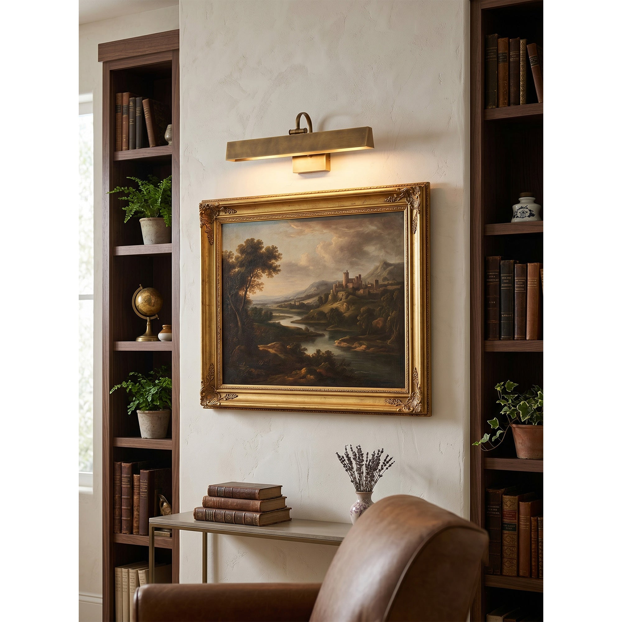 Side view of the Arti Brass Wall Sconce showing its sleek profile.